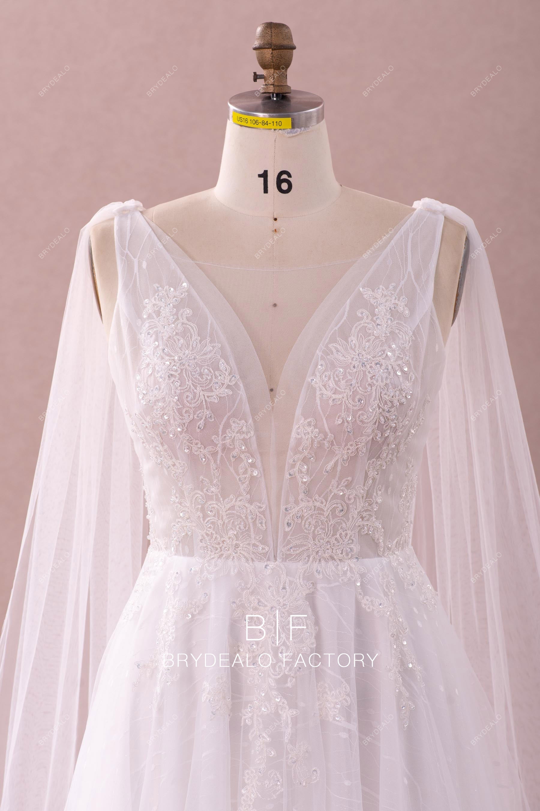 Beaded lace plunging sleeveless wedding dress
