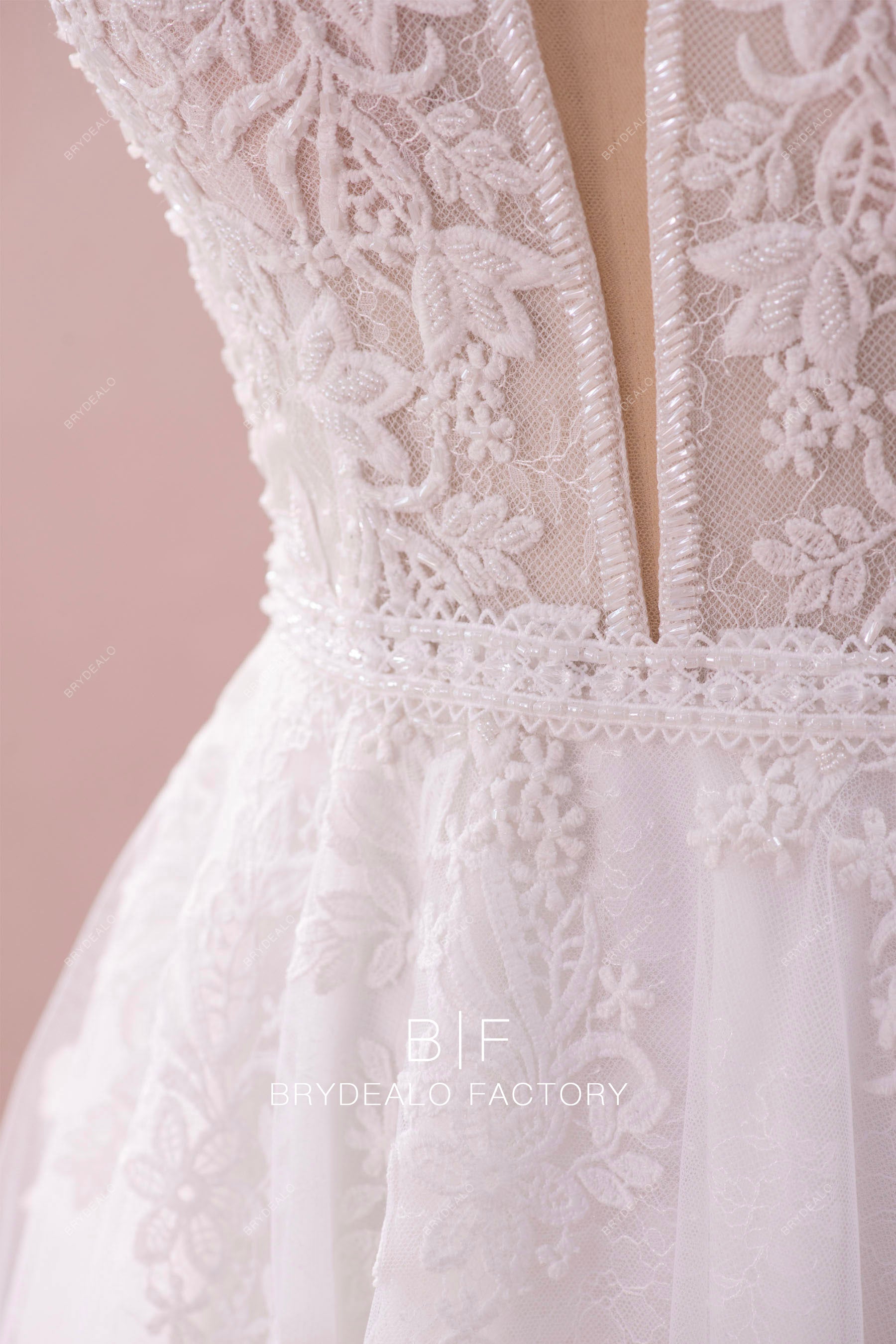 plunging neck beaded lace trim waist designer wedding gown