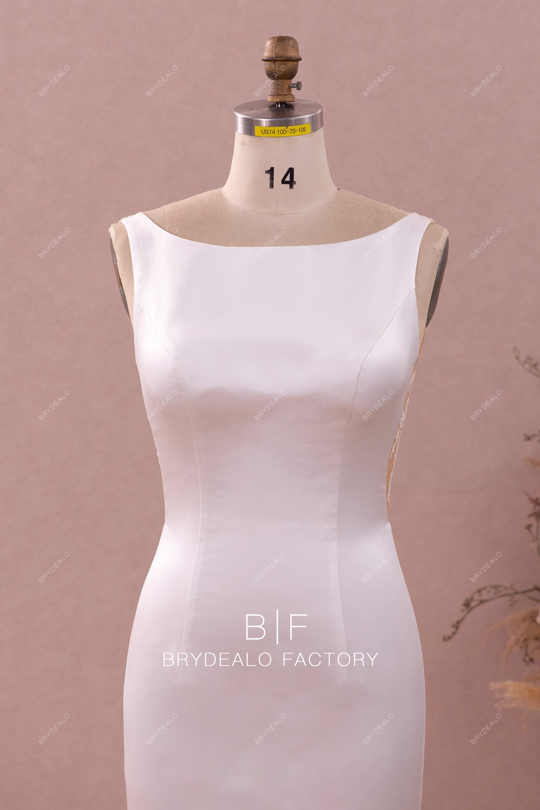 bateau neck sleeveless satin designer bridal dress