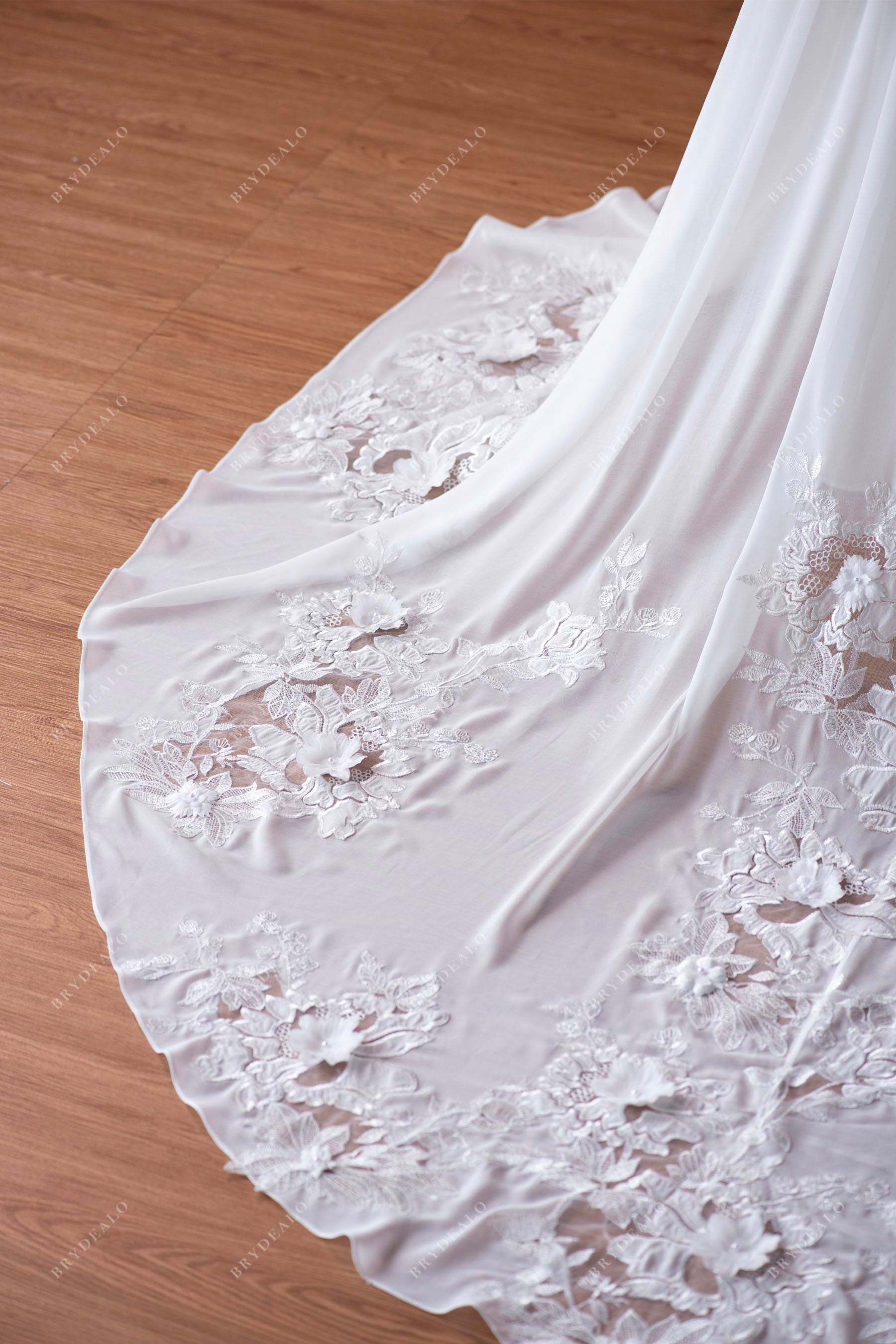 designer illusion lace train bridal gown