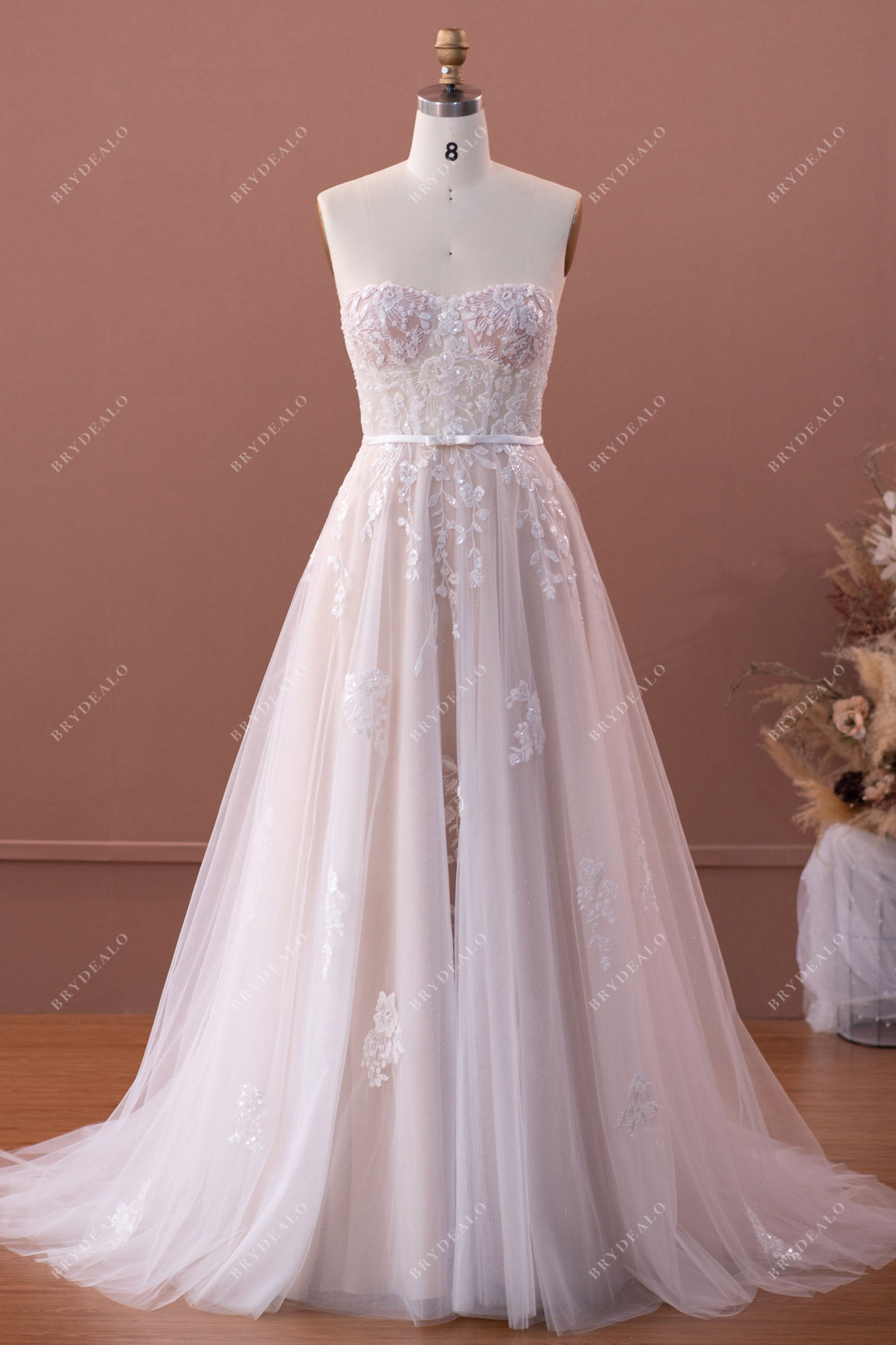 visible boned corset designer lace A-line wedding dress
