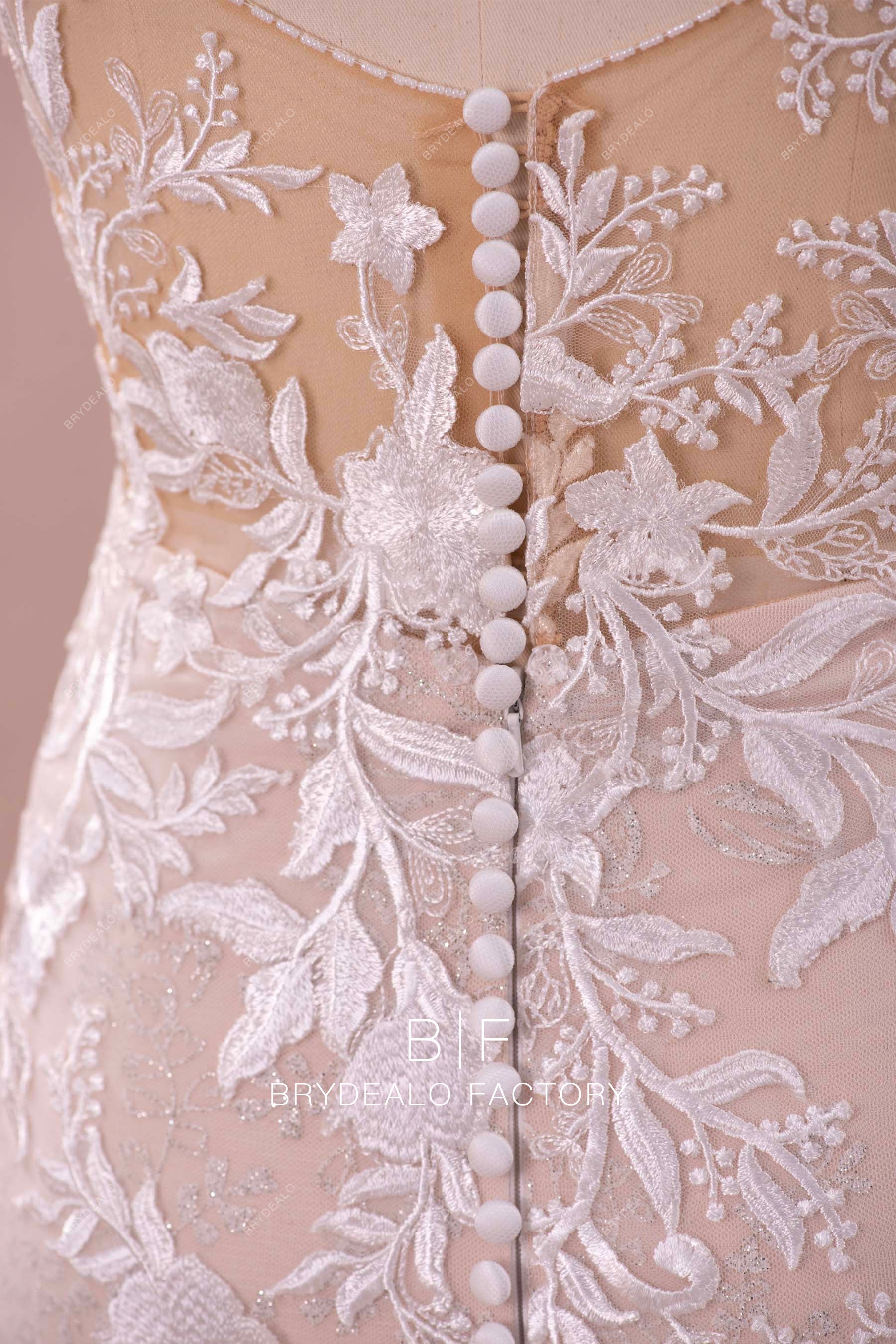 buttoned illusion back wedding dress