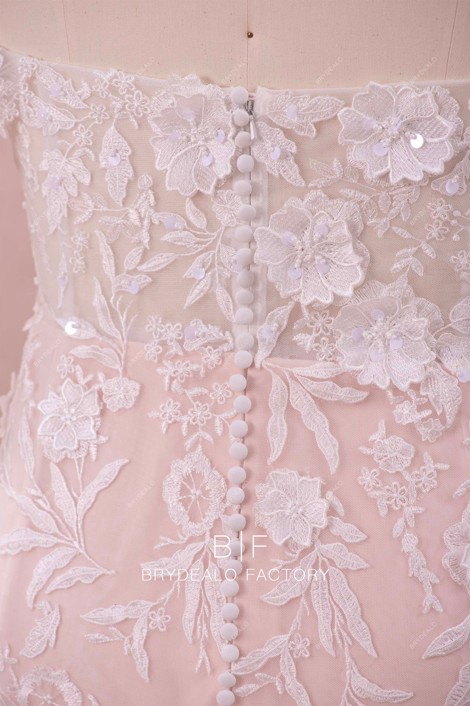 buttoned back nude pink colored wedding dress