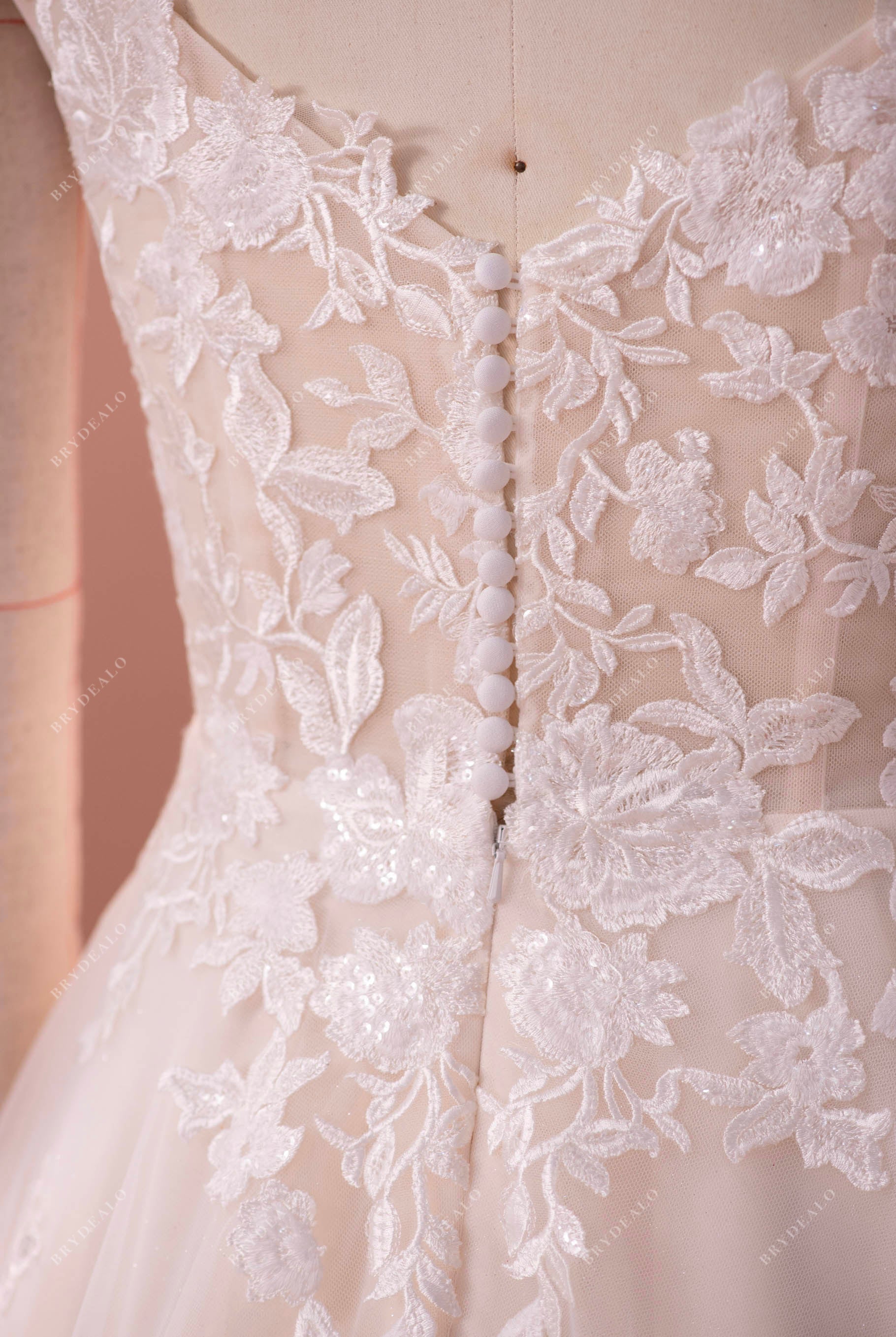 buttoned lace garden wedding dress