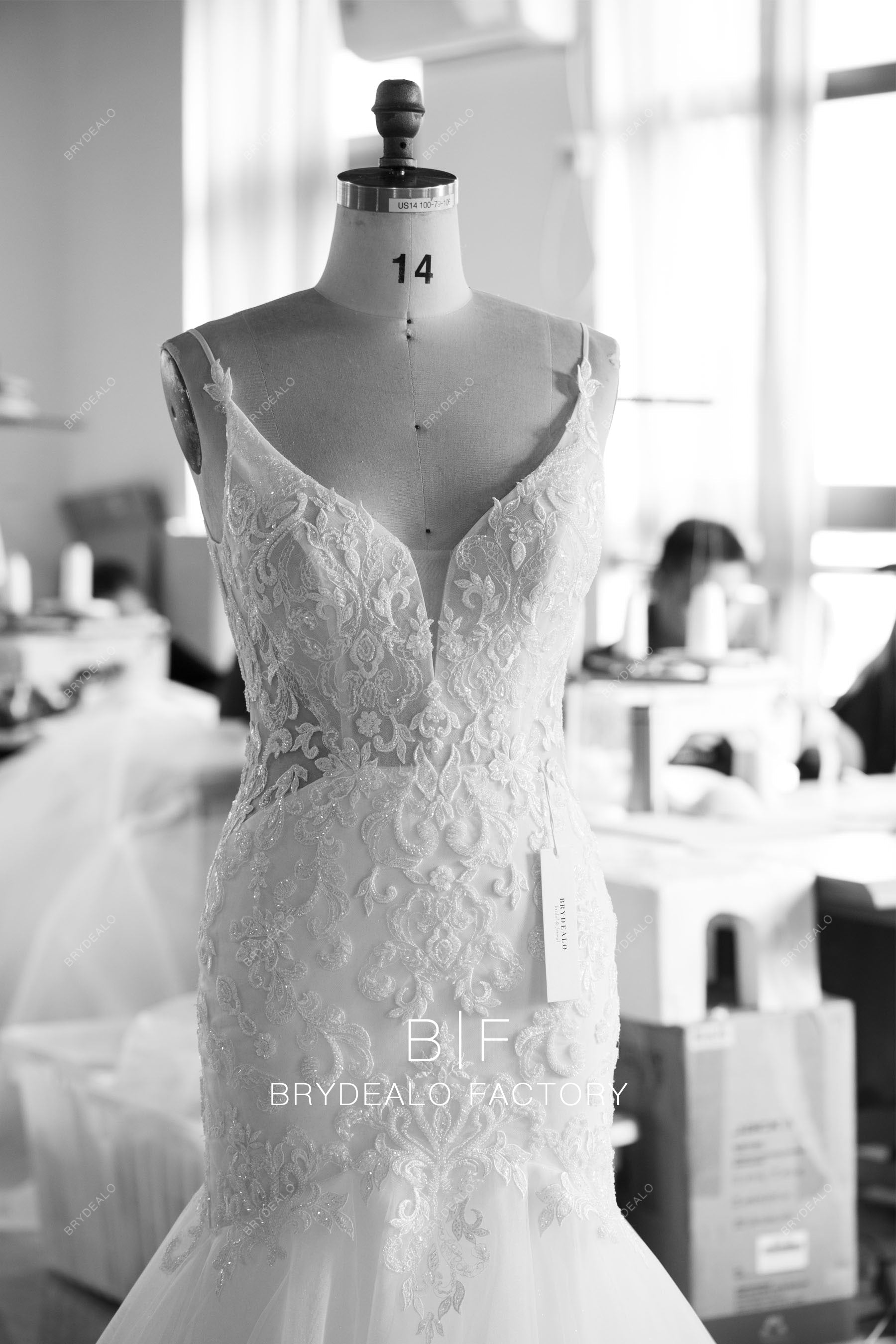 custom spaghetti straps plunging neck beaded lace bridal gown