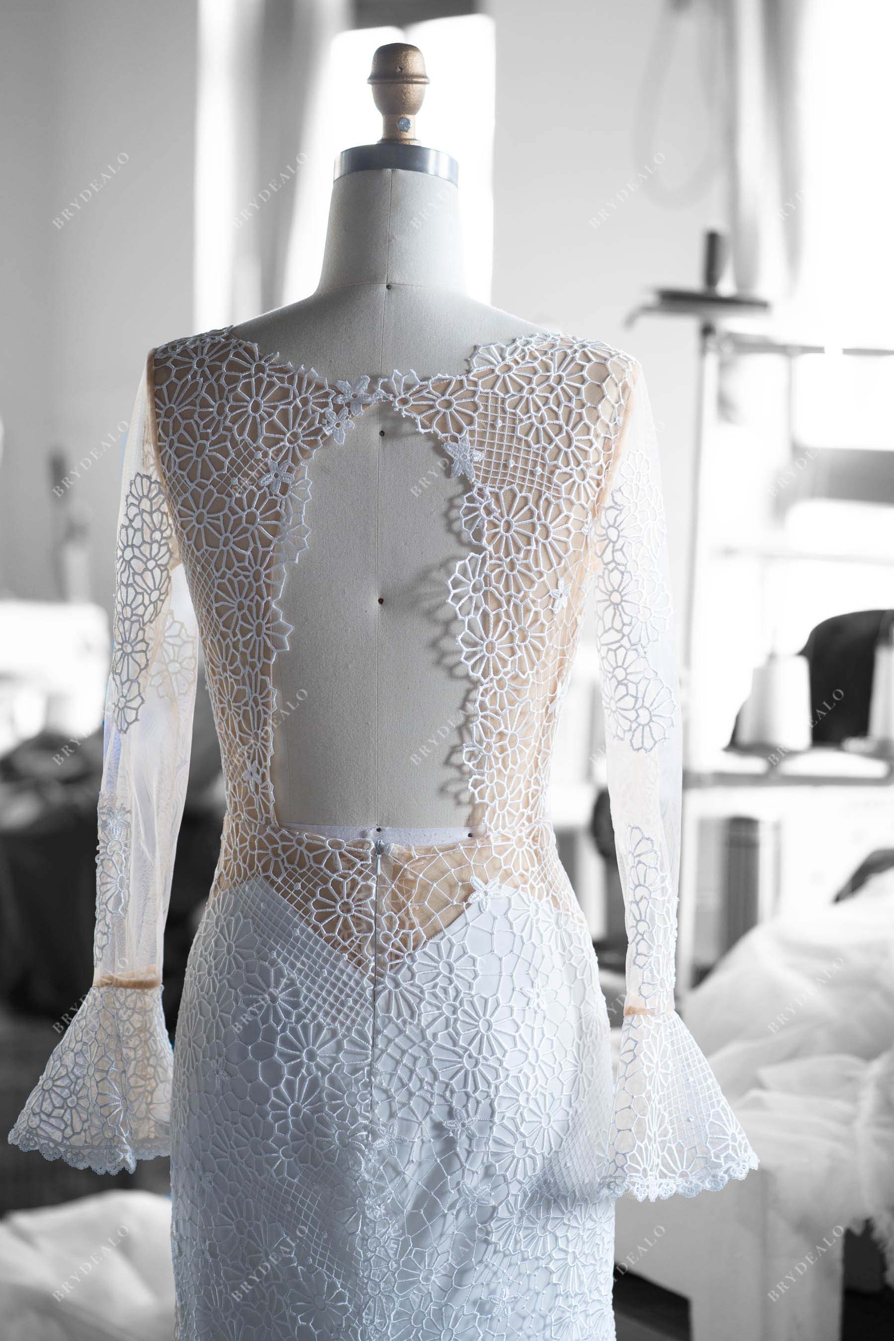 tailored cutout back sheer sleeves bridal gown