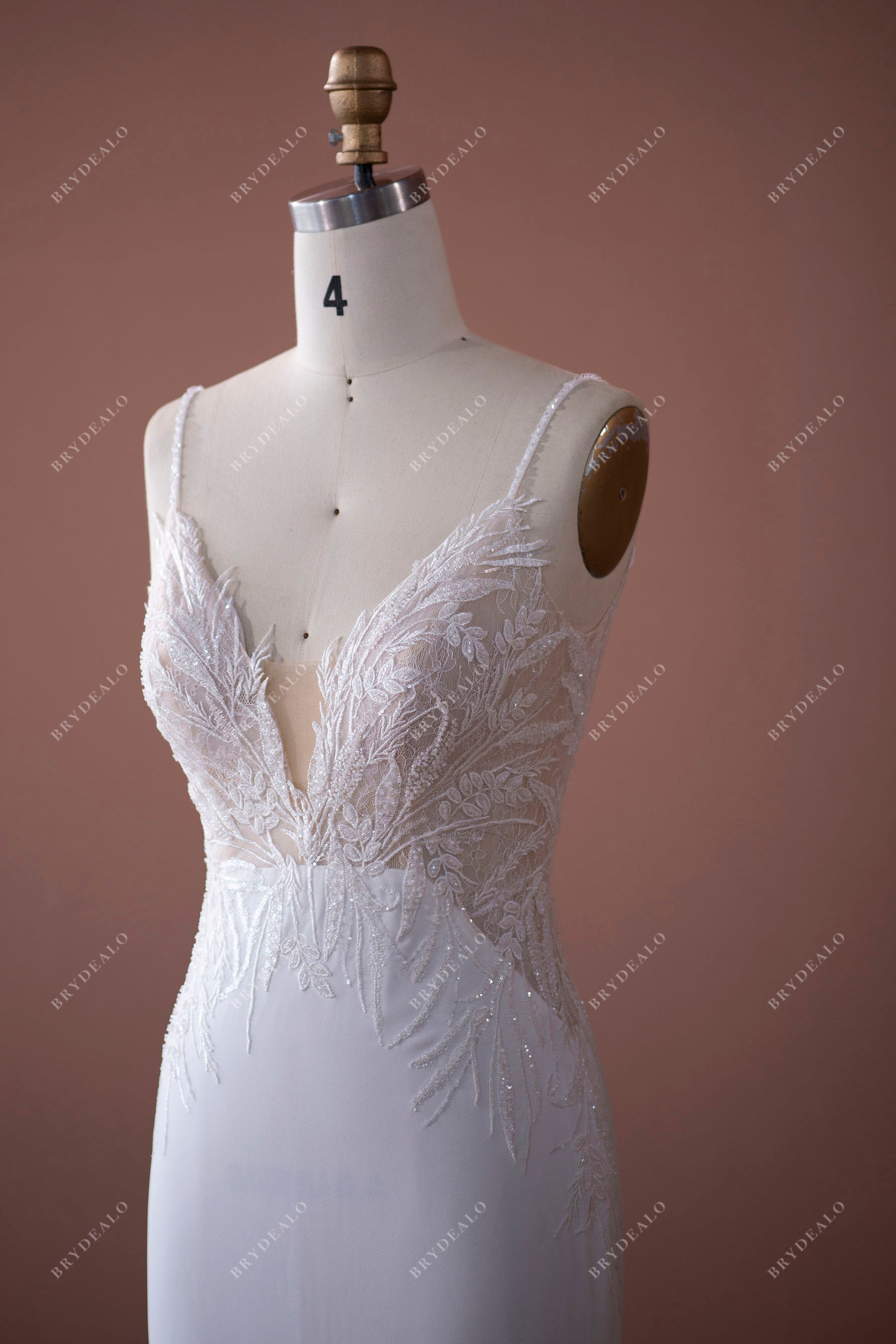 plunging neck beaded lace wedding gown