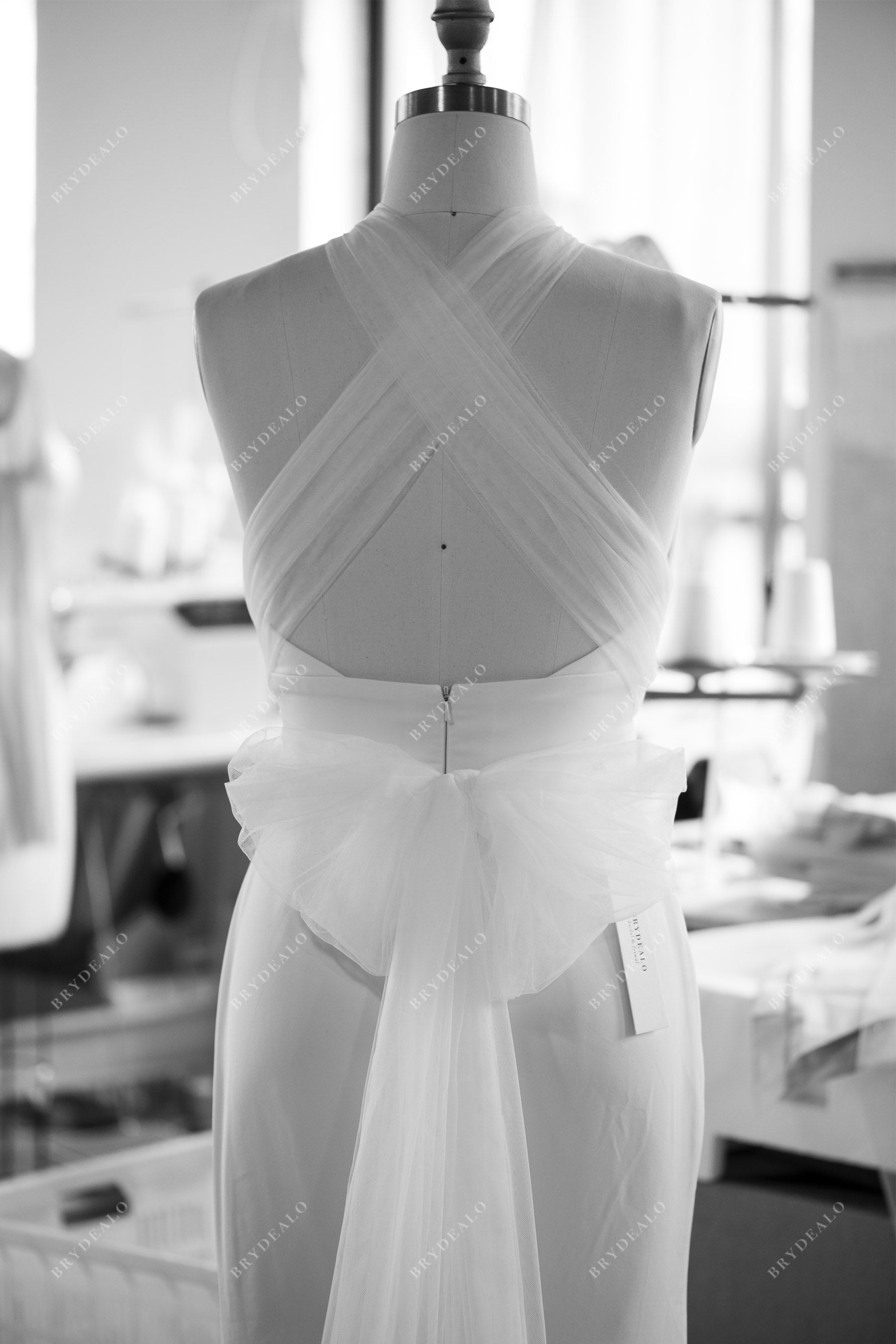 designer satin tulle crisscross back wedding gown
