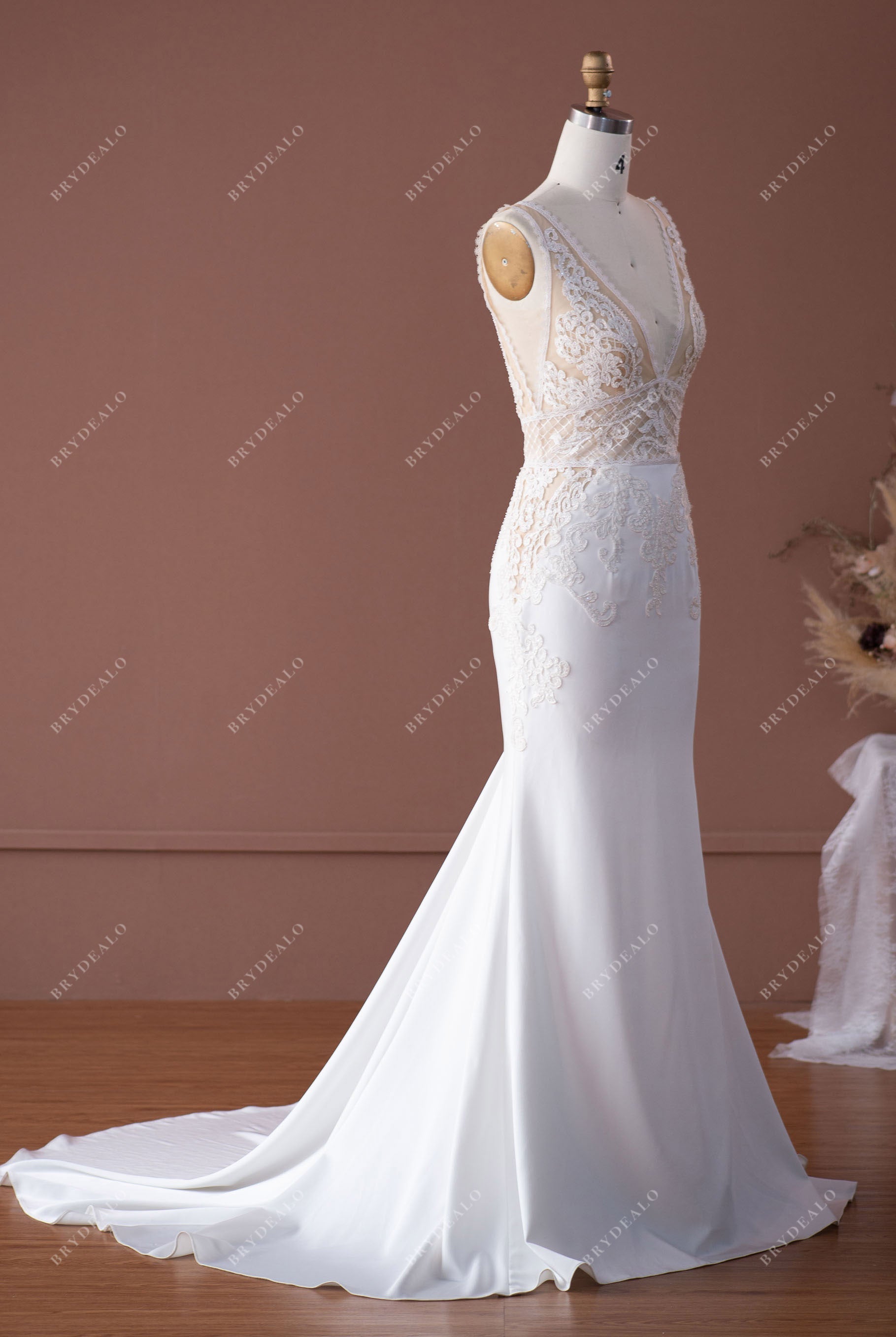 Sleeveless designer lace satin court train bridal dress