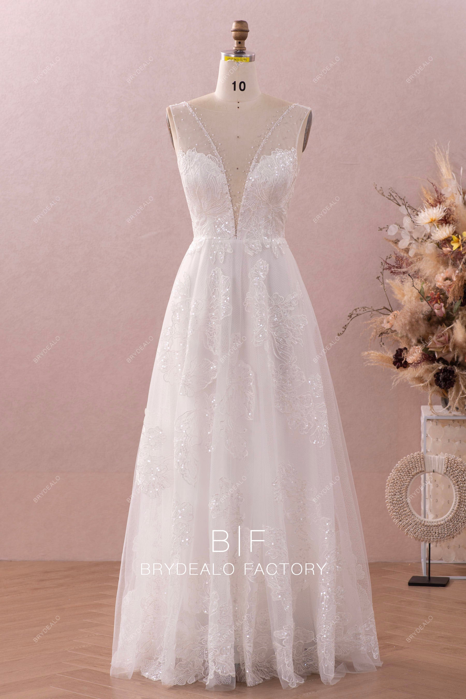 plunging neck sleeveless shimmery lace A-line wedding dress