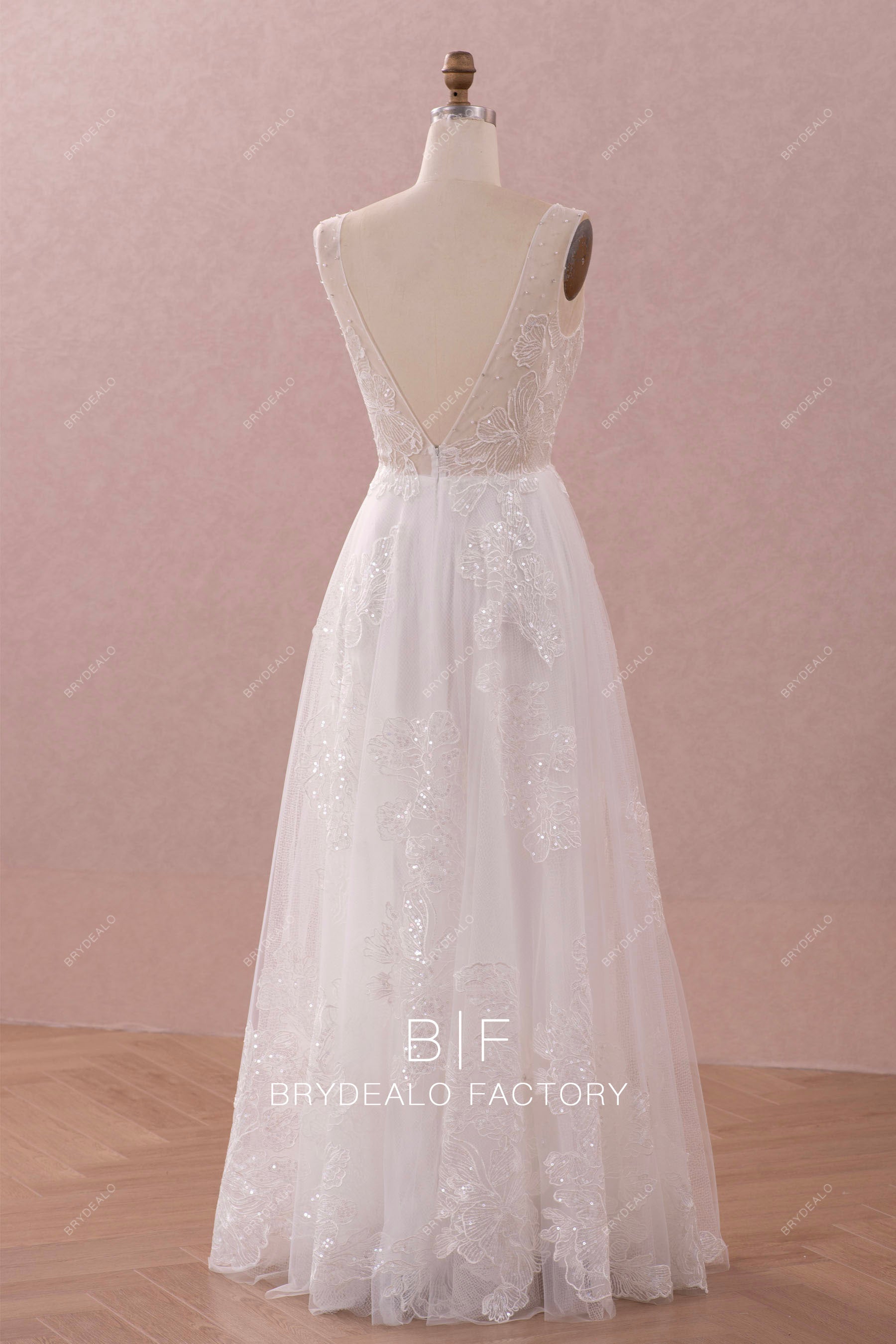 sheer V-back lace floor length bridal gown