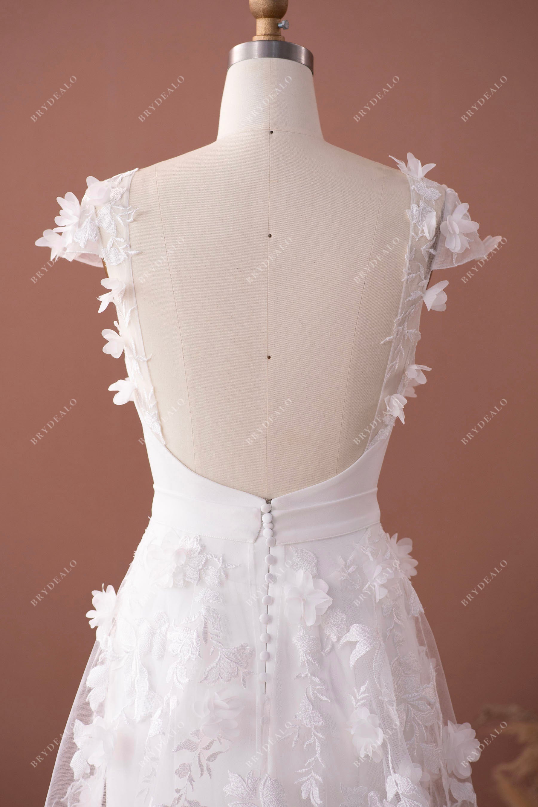 Alluring open back cap sleeve outdoor wedding gown