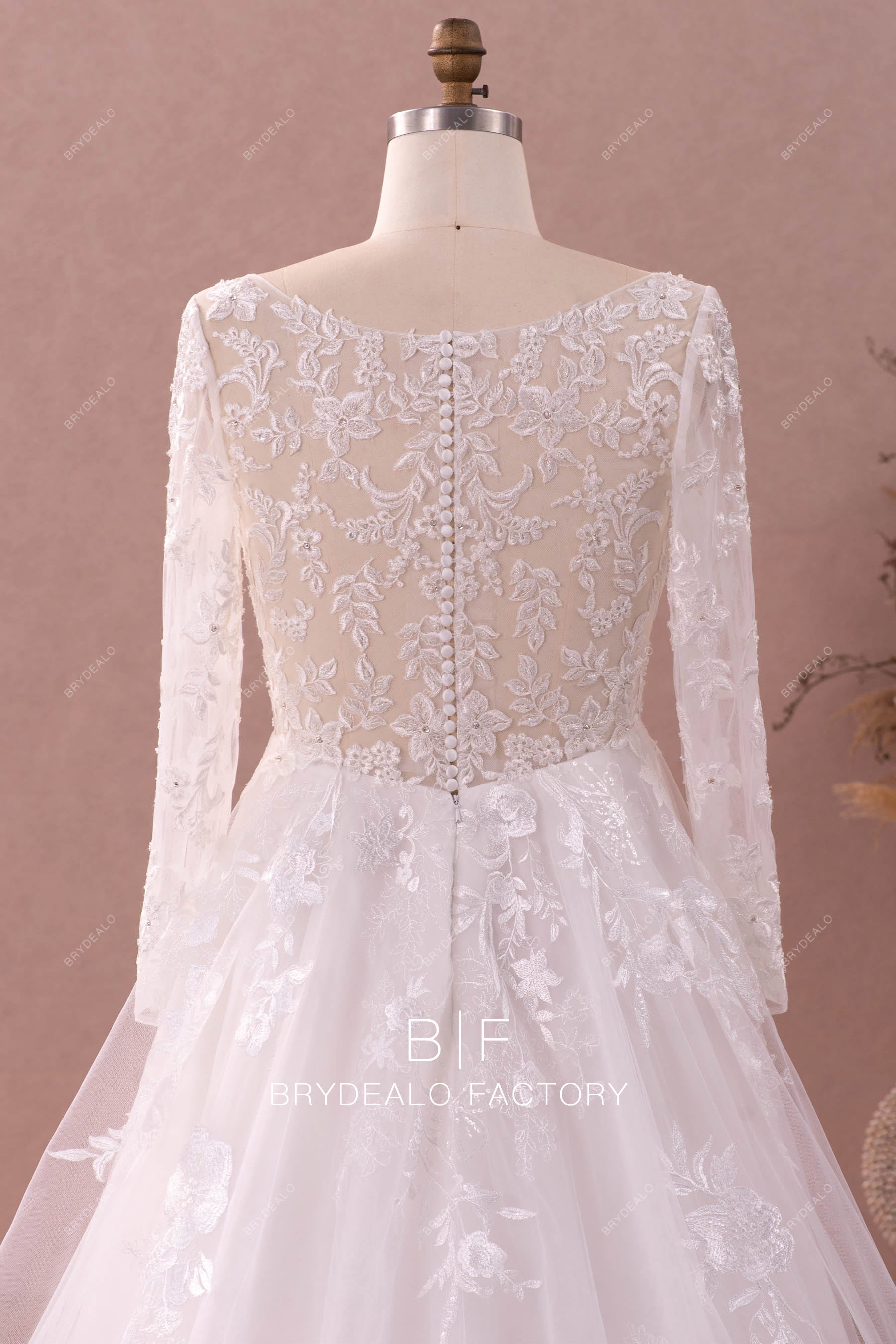 long sleeves illusion buttoned back lace bridal gown