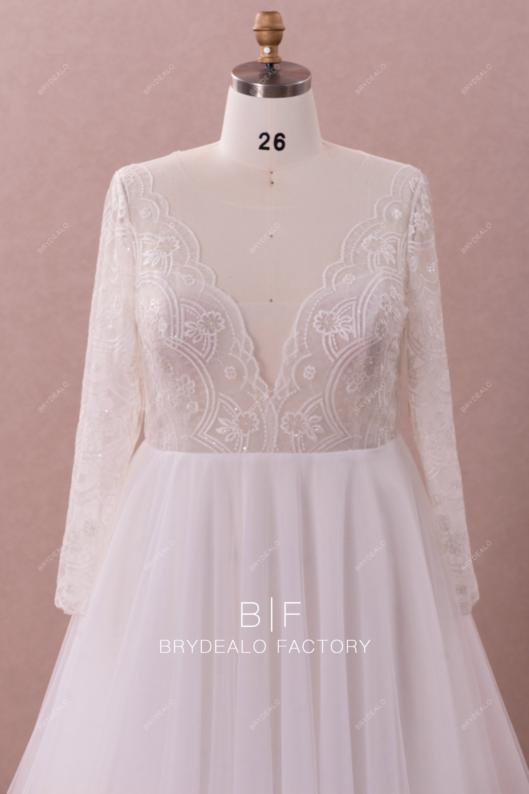designer scalloped plunging neck lace wedding dress