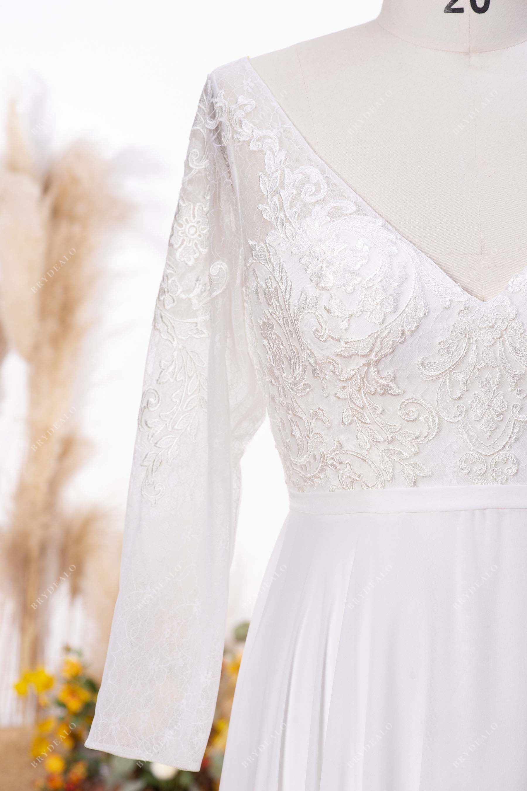 sheer sleeves designer lace V-neck lightweight bridal gown