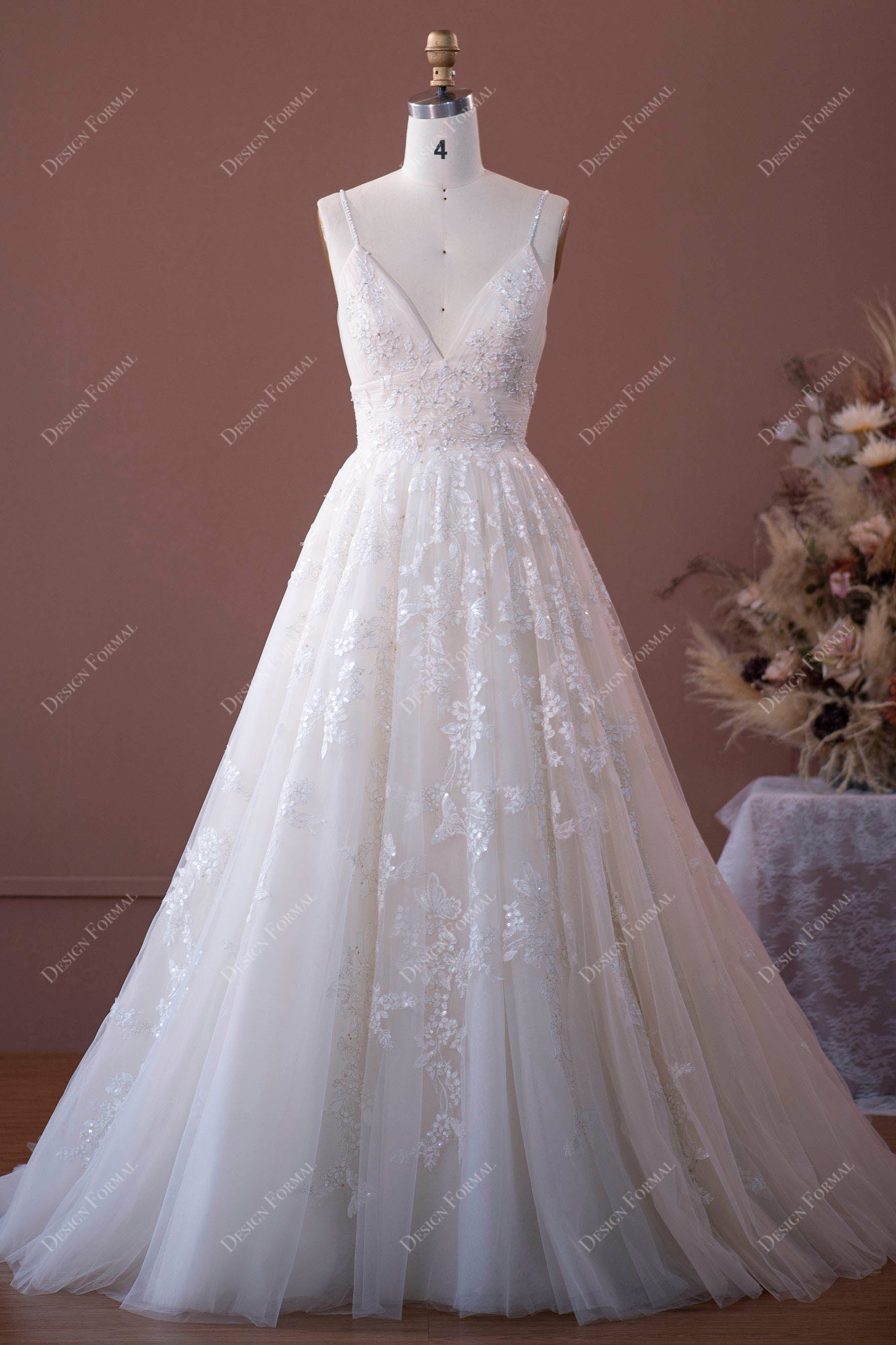 lace appliqued spaghetti straps plunging wedding dress 