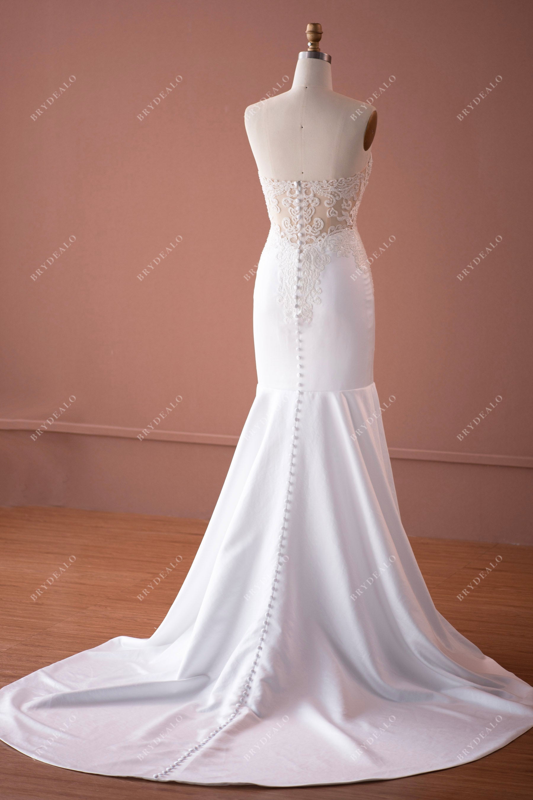 lace appliqued illusion back wedding dress