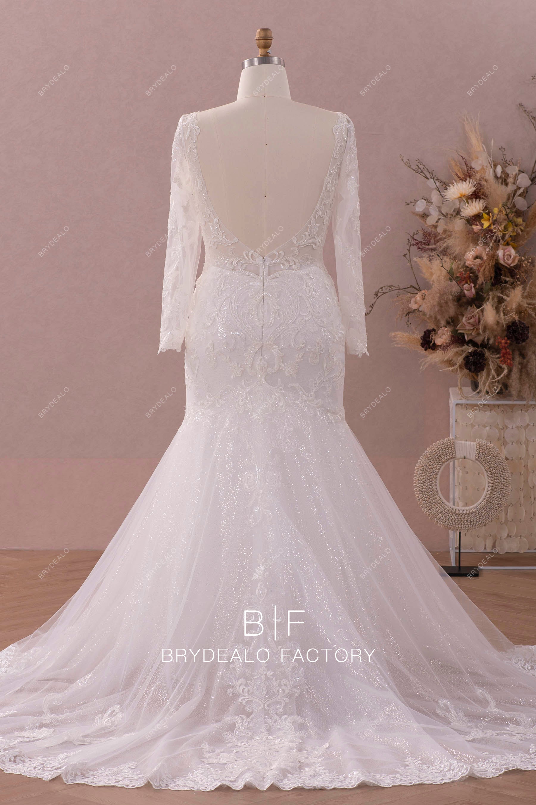 long sleeved open back plus size mermaid wedding gown