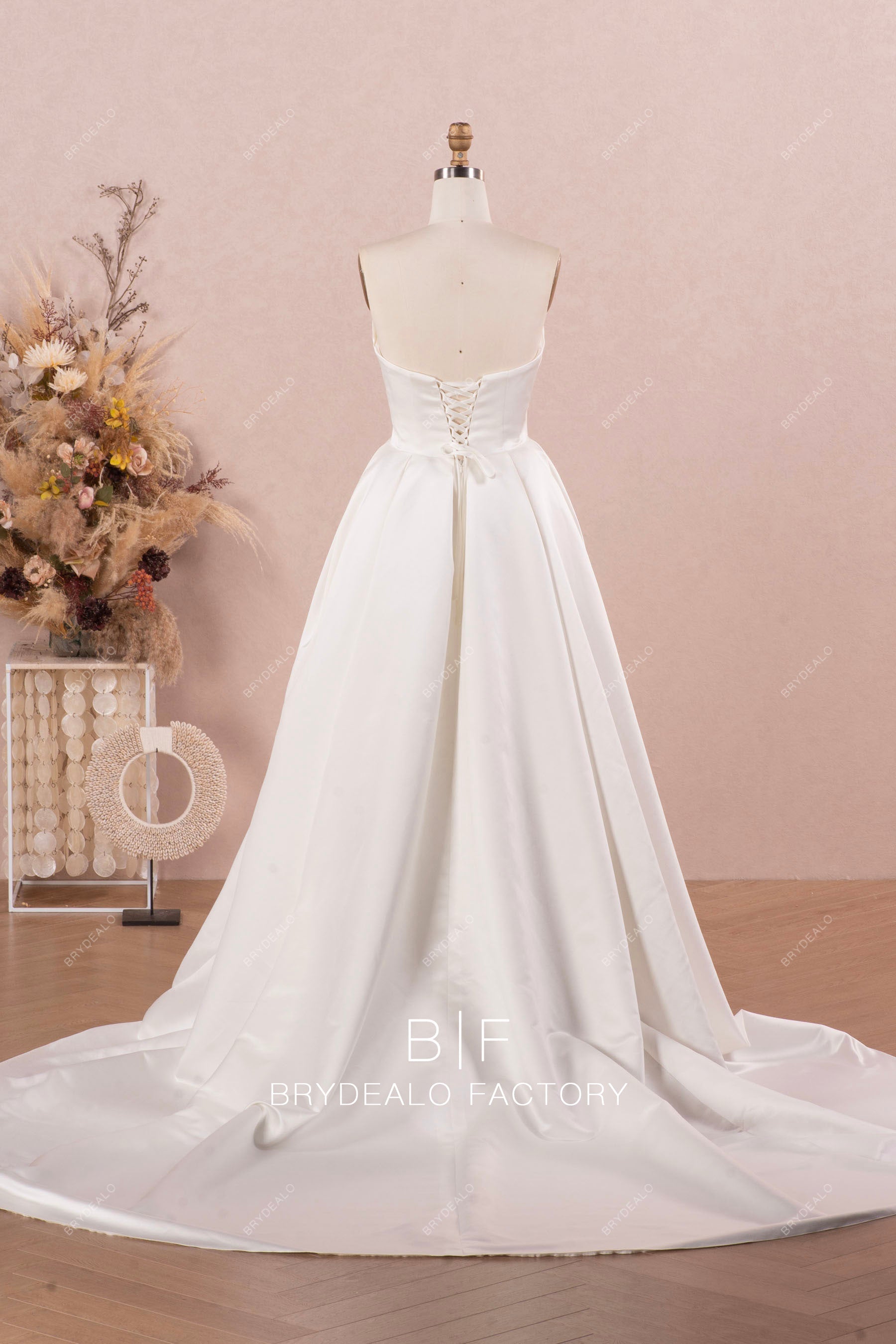 long strapless lace up back satin modern bridal gown