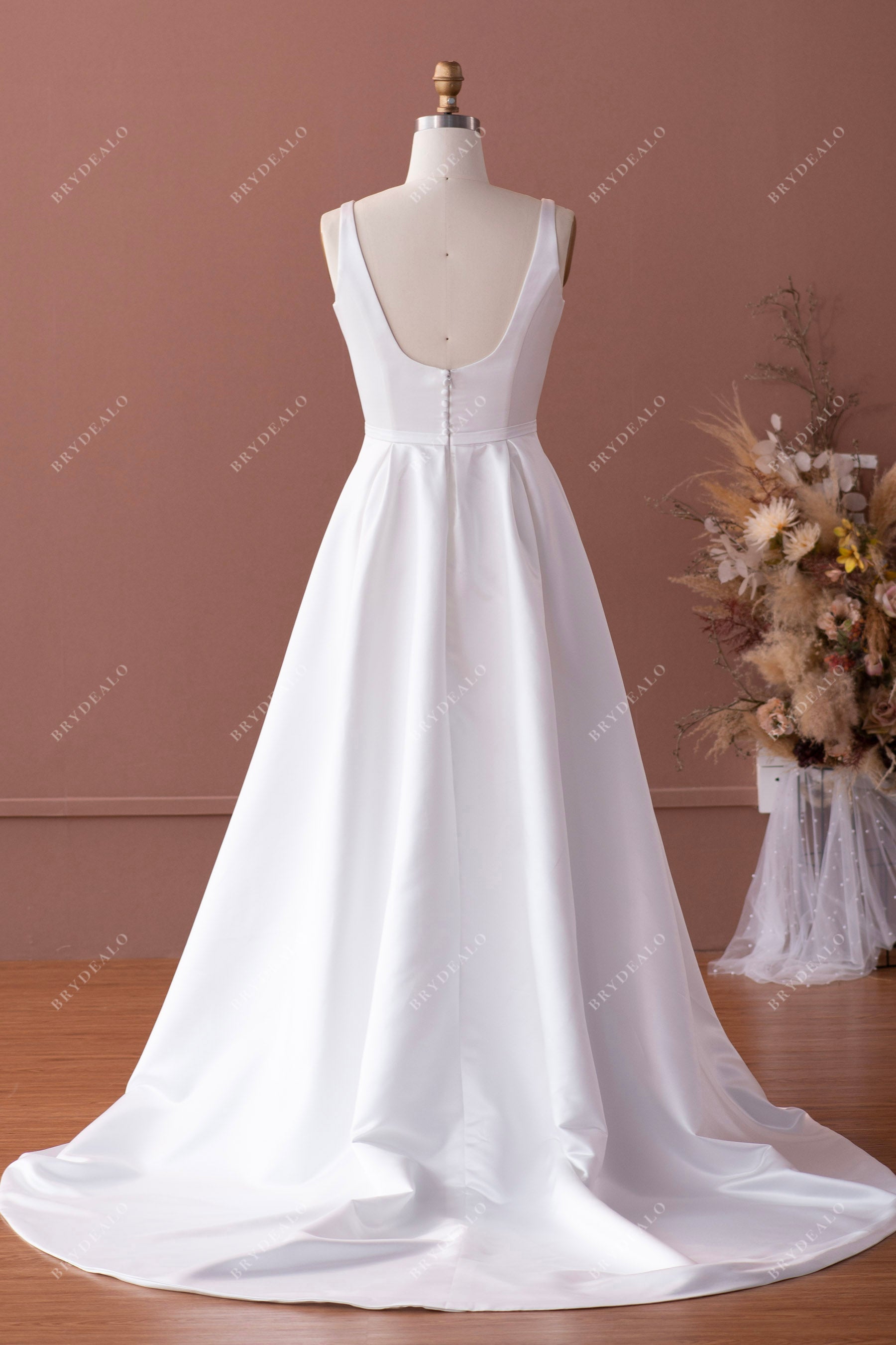 sleeveless open scoop back demure wedding gown