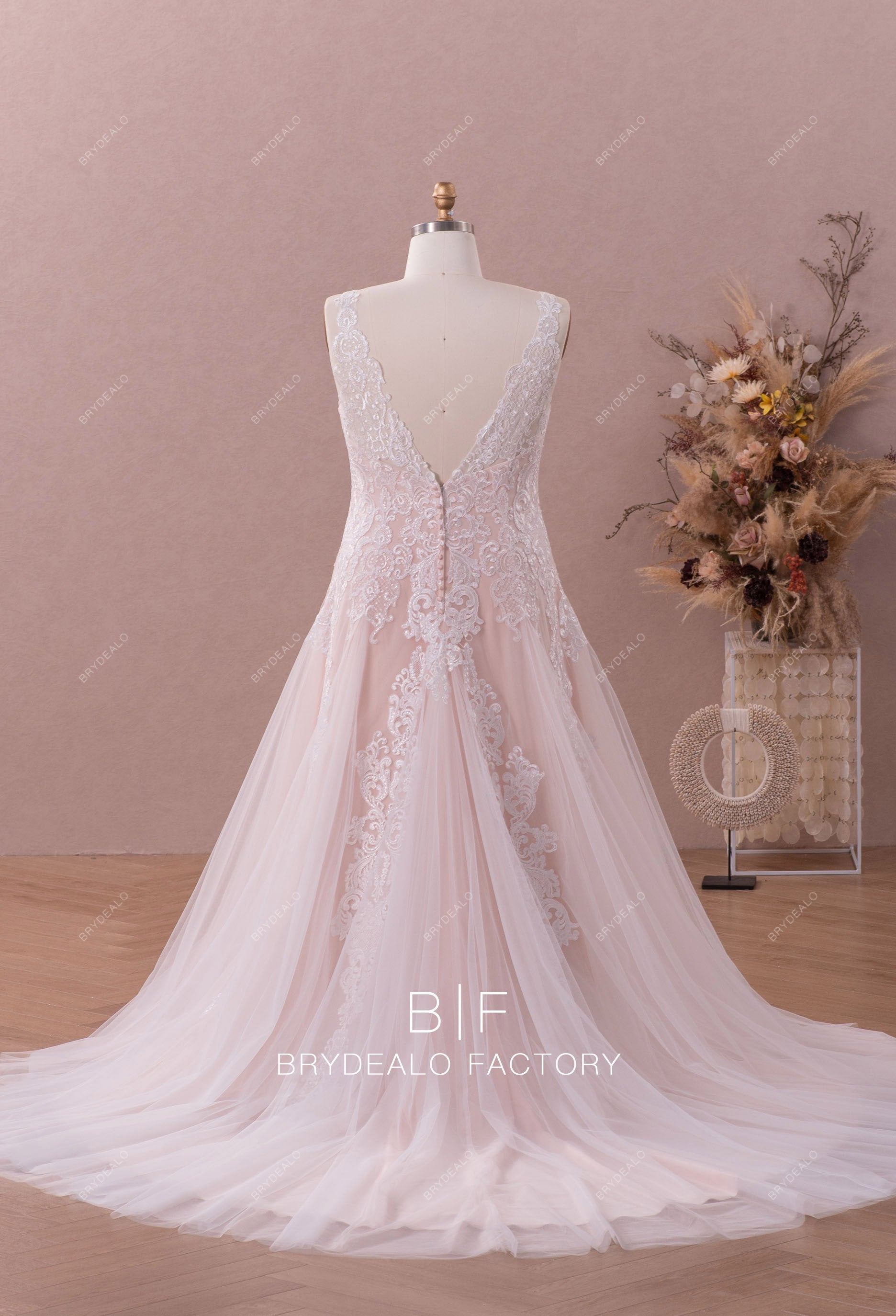 sleeveless V-back fit flare destination bridal gown