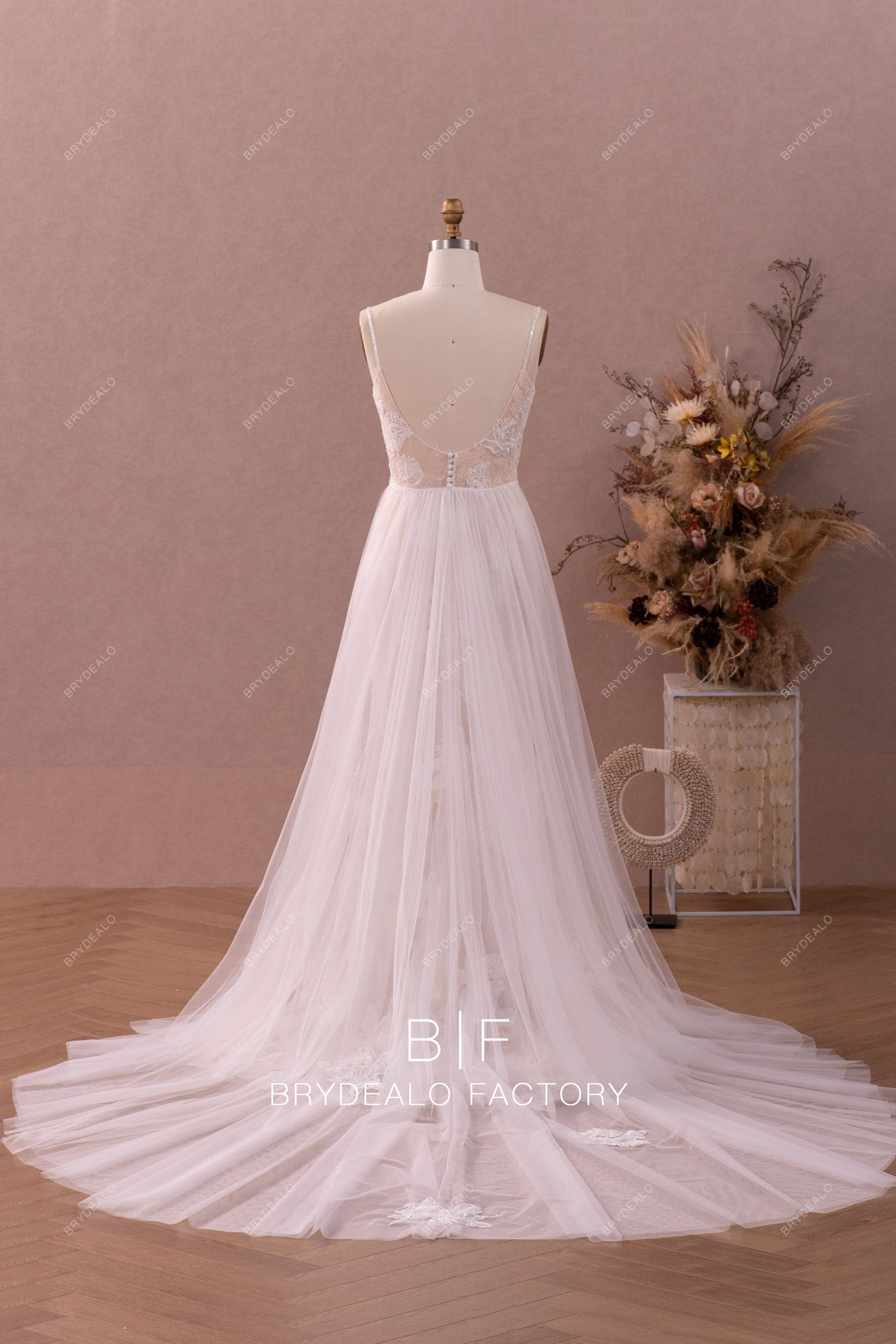 A-line overskirt open back wedding dress