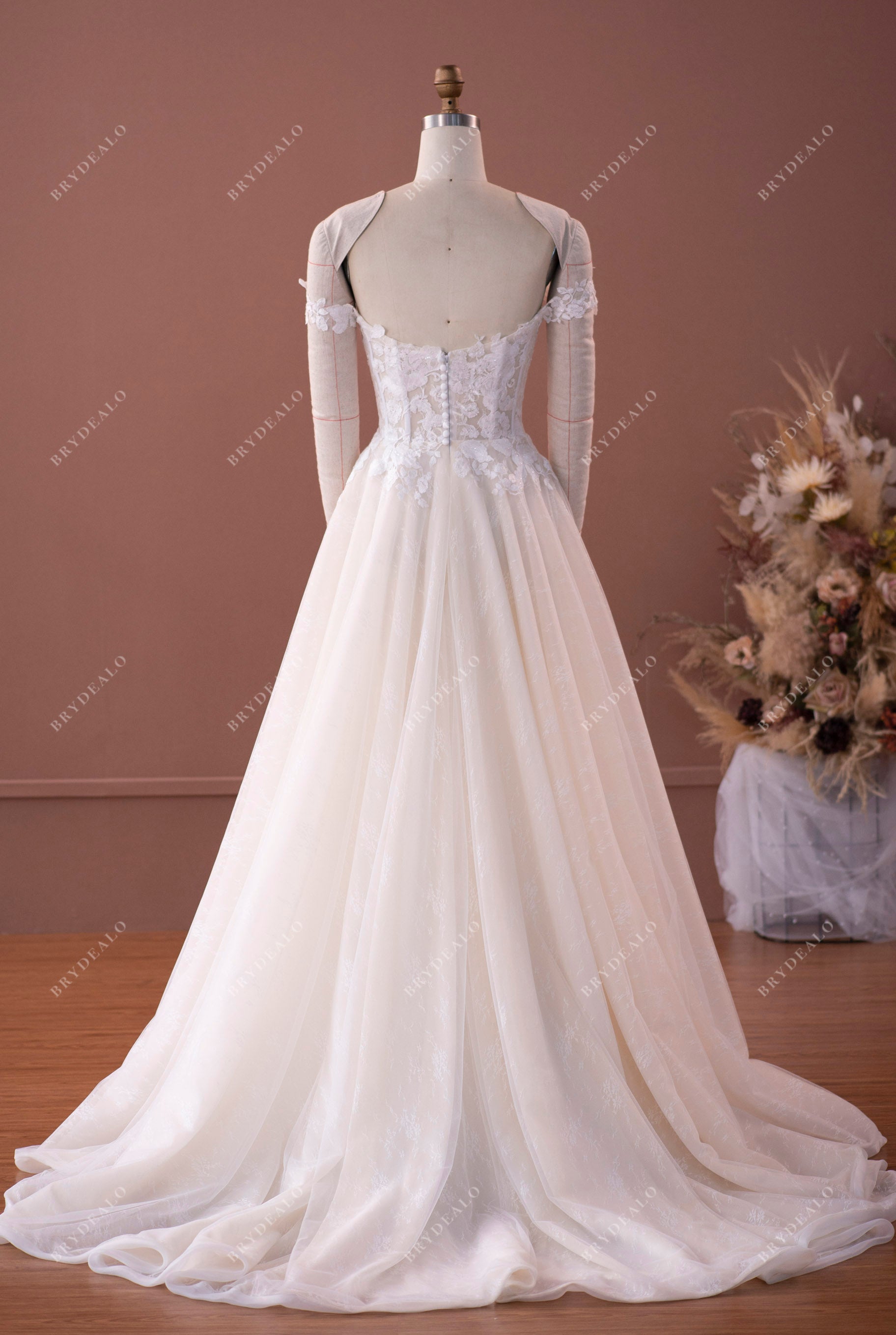 puffy A-line garden lace medium-length train wedding dress