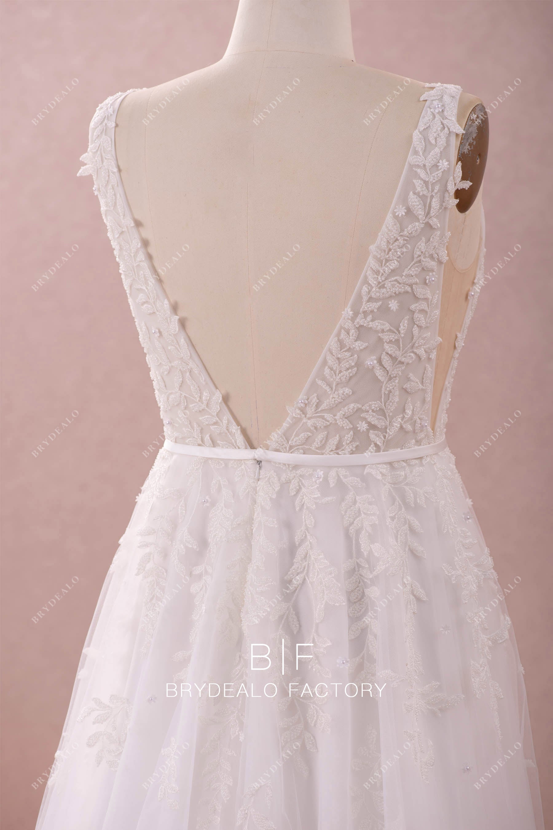 open back sleeveless beaded lace wedding gown