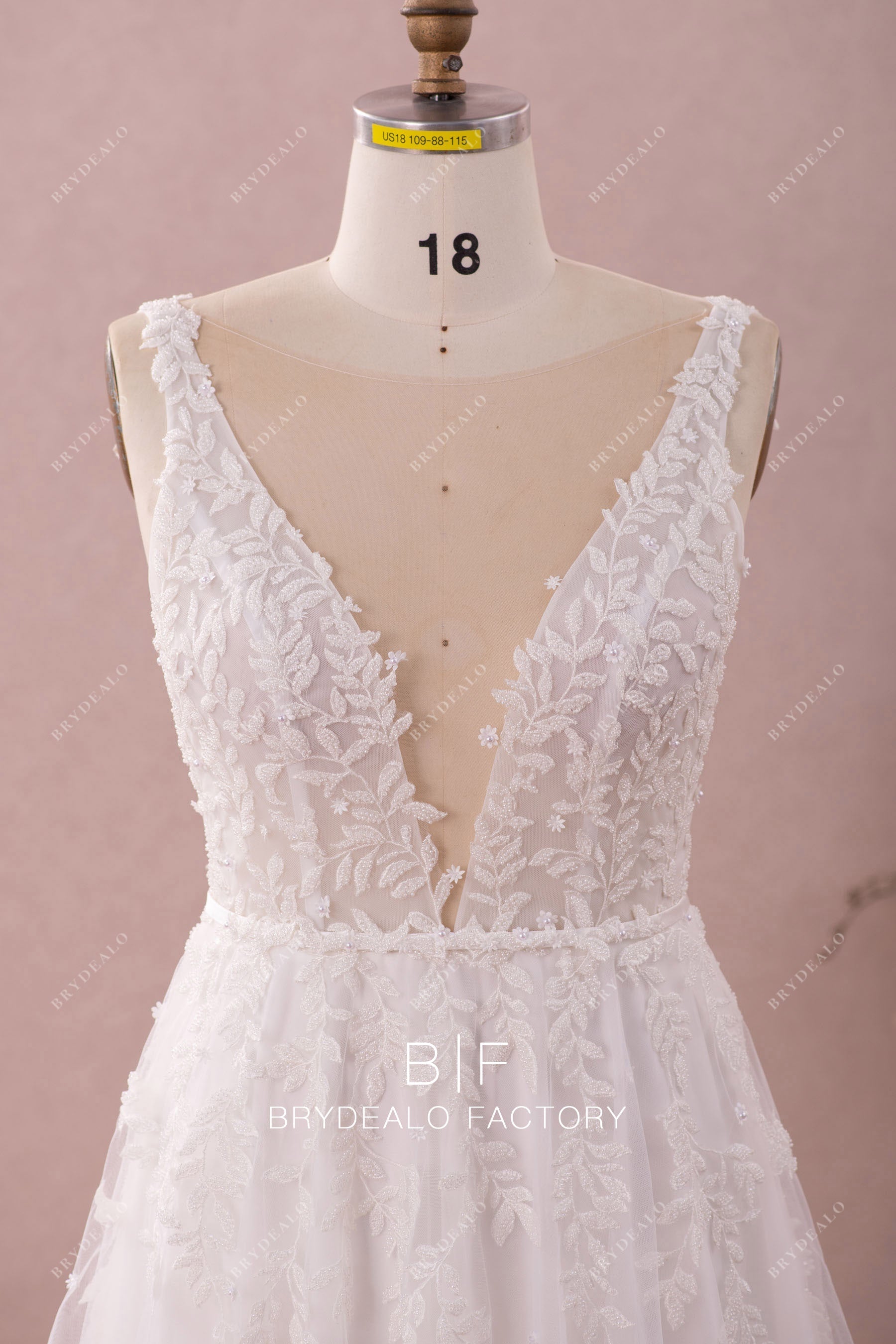 deep V-neck beaded lace wedding dress
