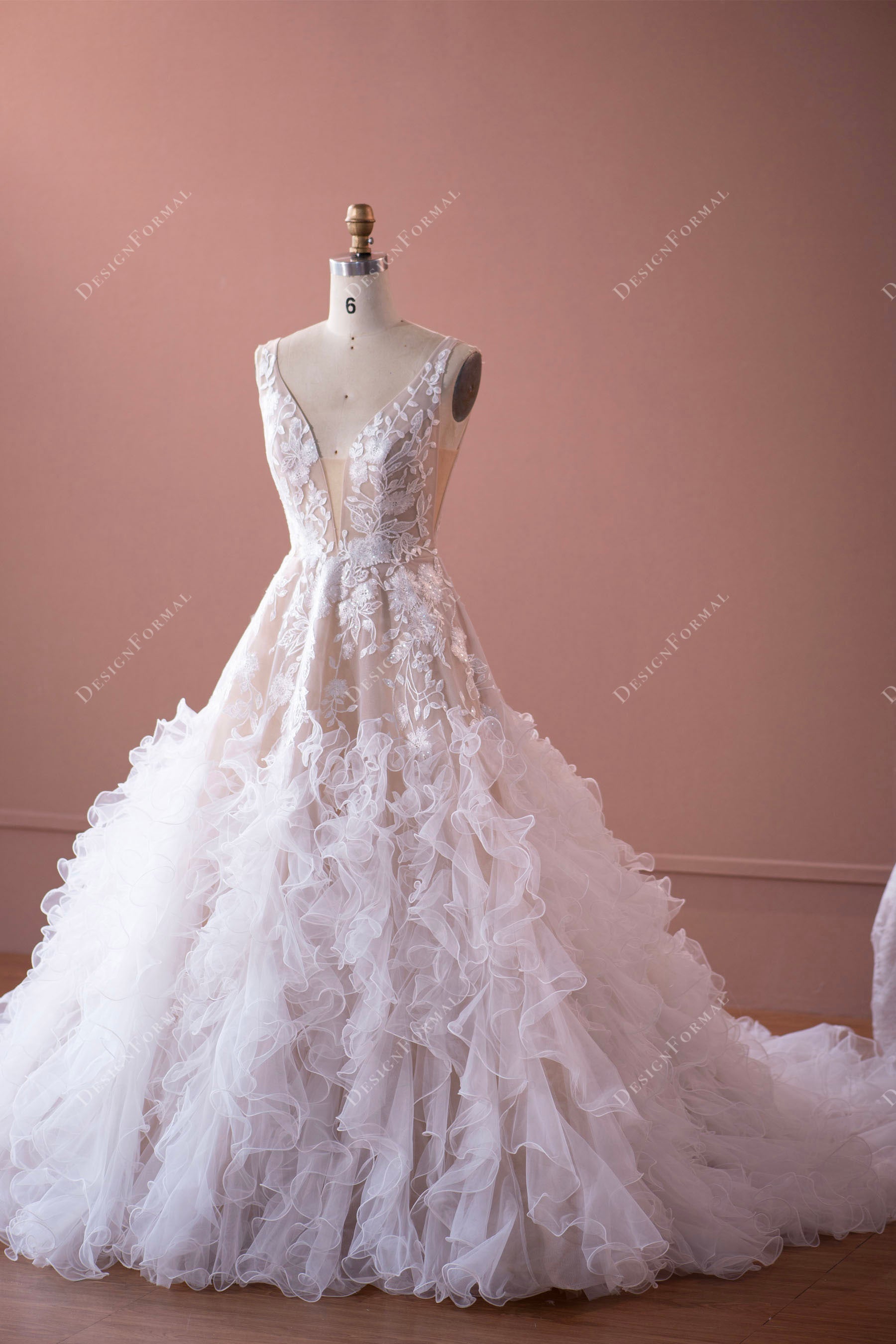 plunging lace ruffled puffy A-line wedding dress