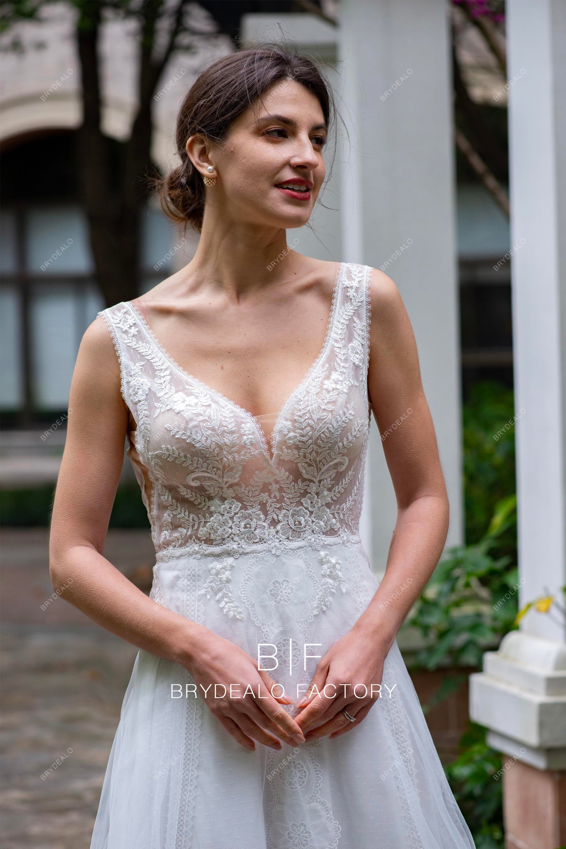 white sleeveless plunging neck lace tulle boho wedding dress