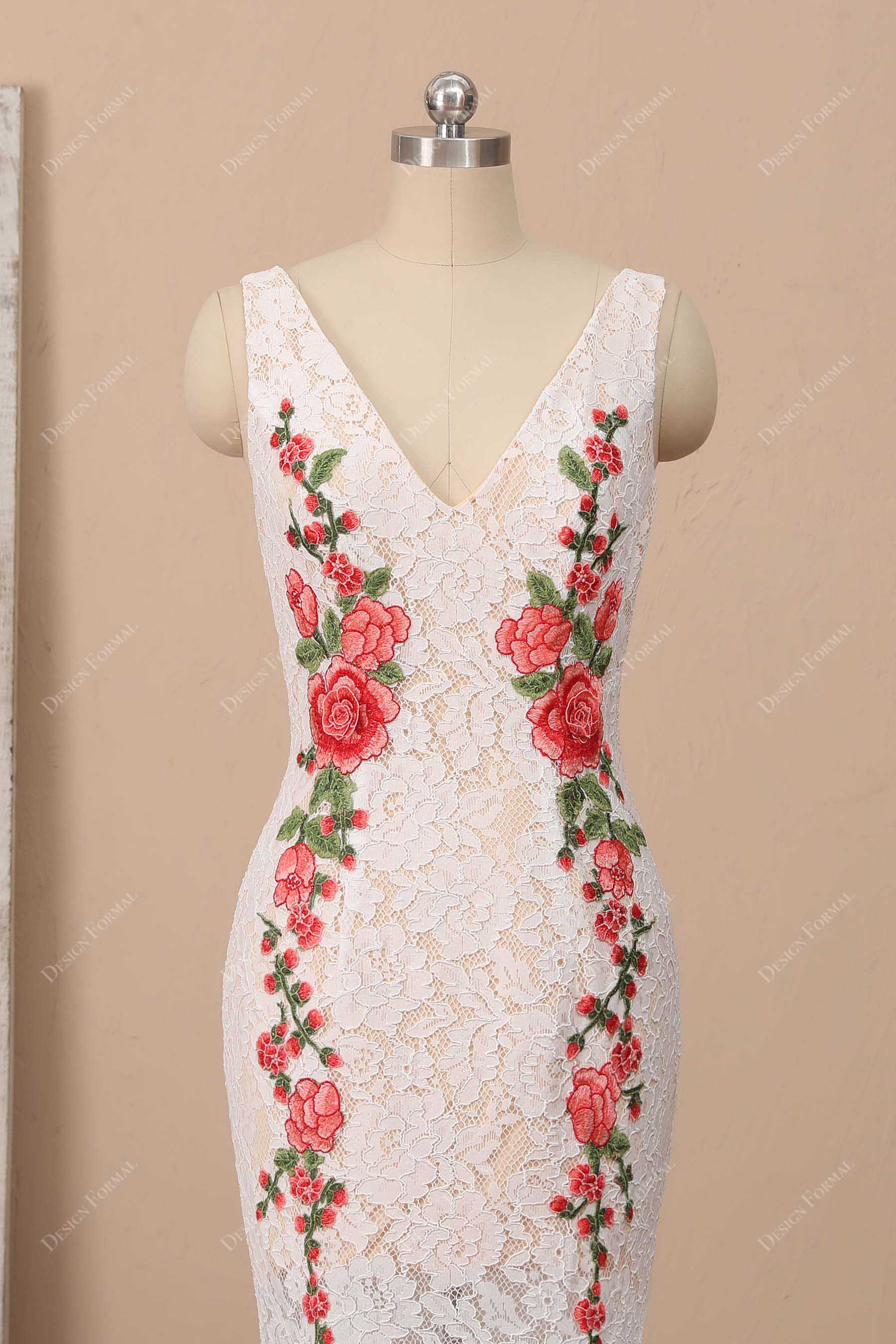 red appliqued light ivory lace V-neck mermaid bridal dress
