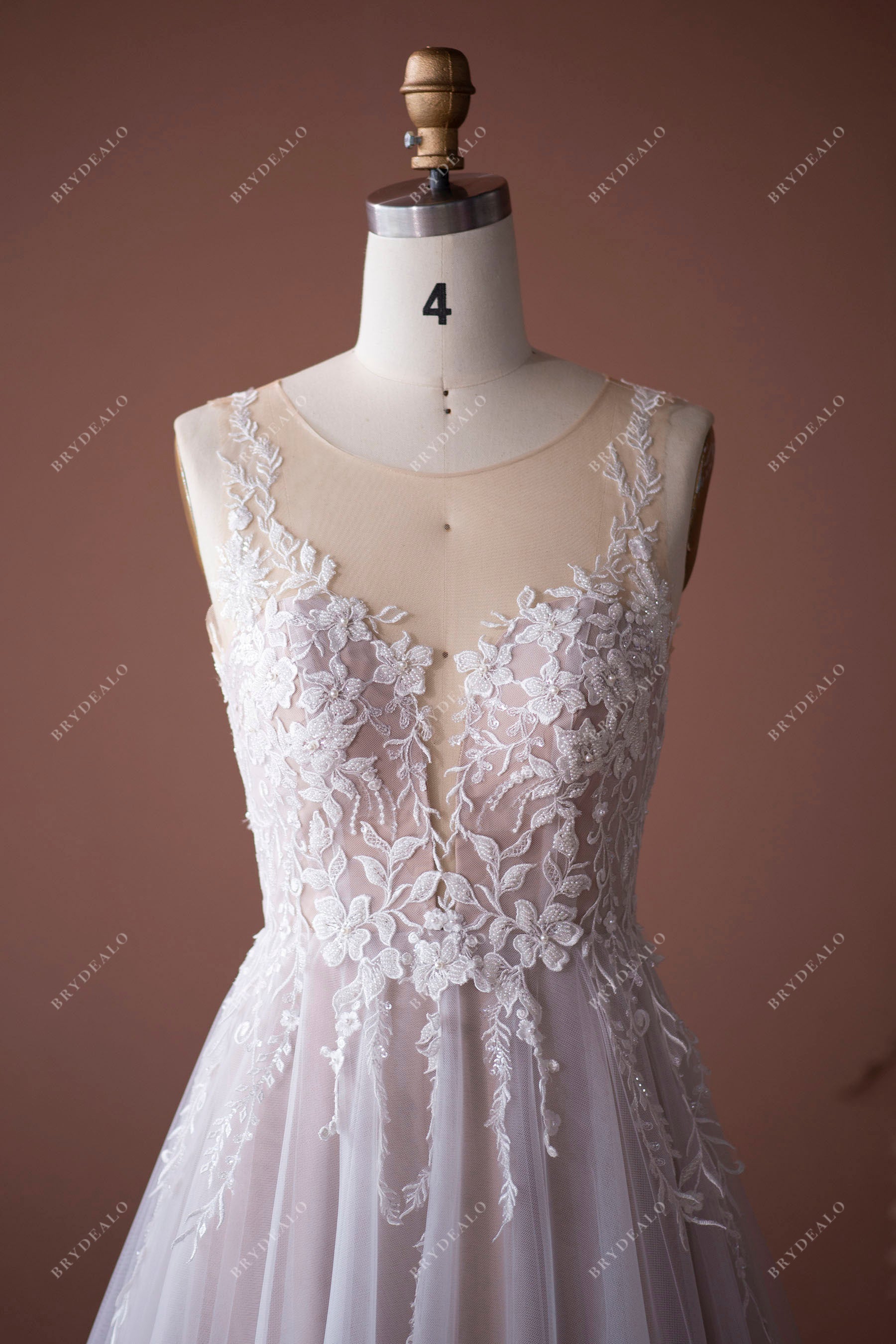 illusion neck sleeveless designer lace bridal gown