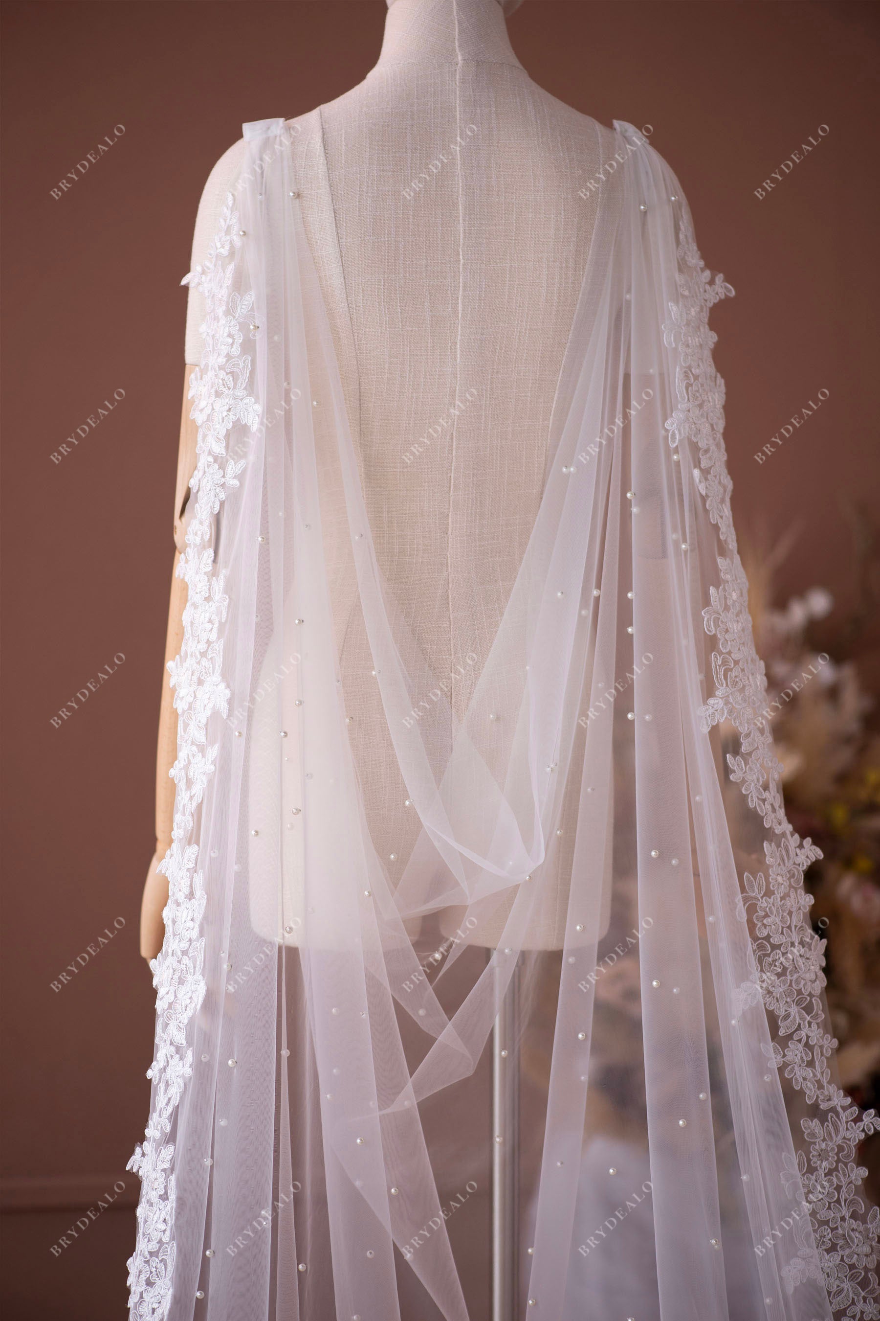 Saggy lace wedding cape 