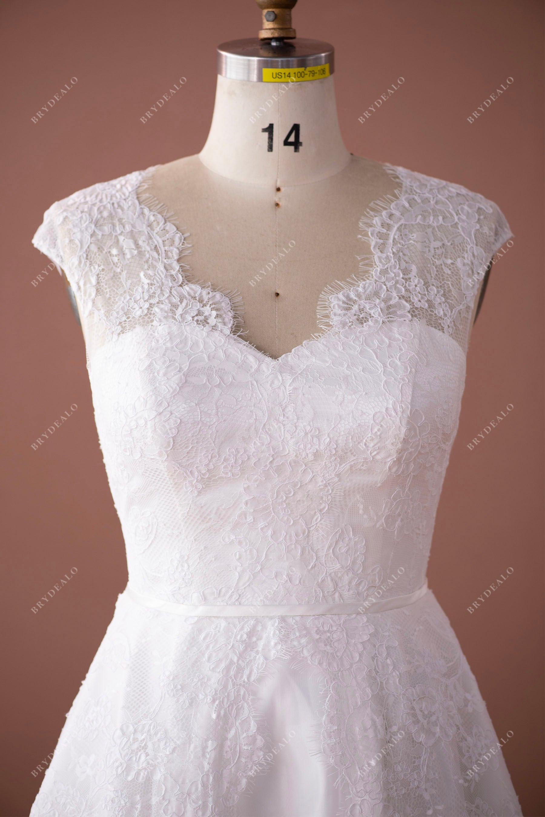 scalloped neck cap sleeves lace city wedding gown
