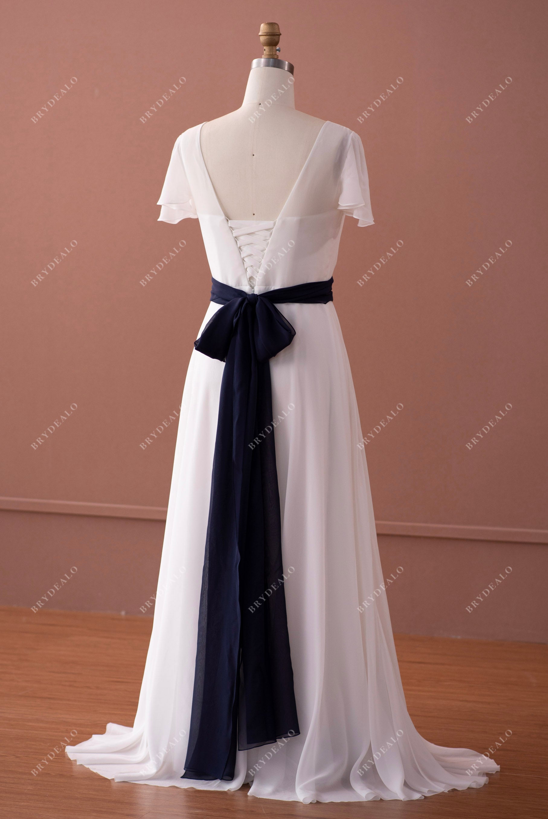 lace up back flutter-sleeve navy sash summer wedding dress
