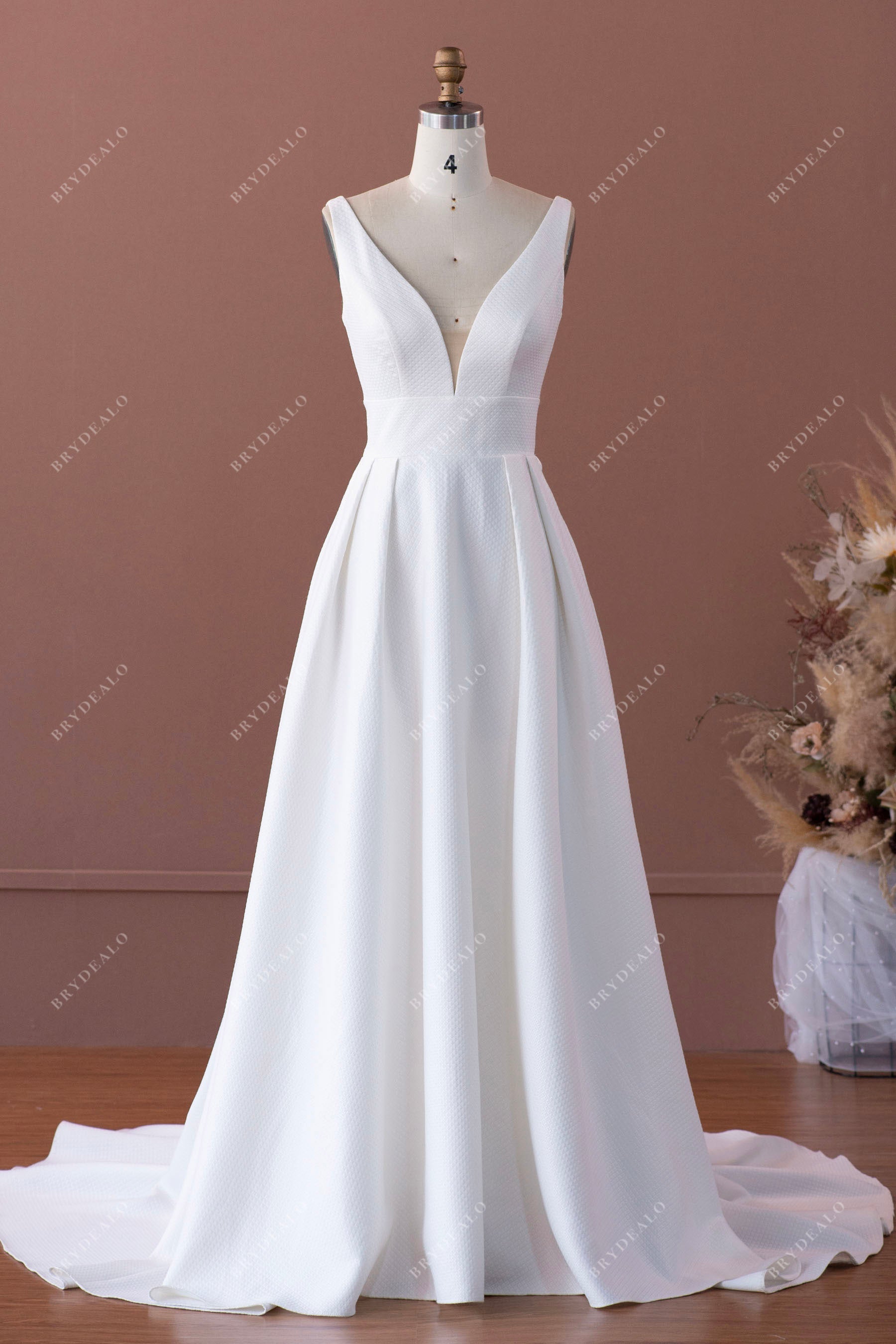 plunging neck pleated A-line wedding dress