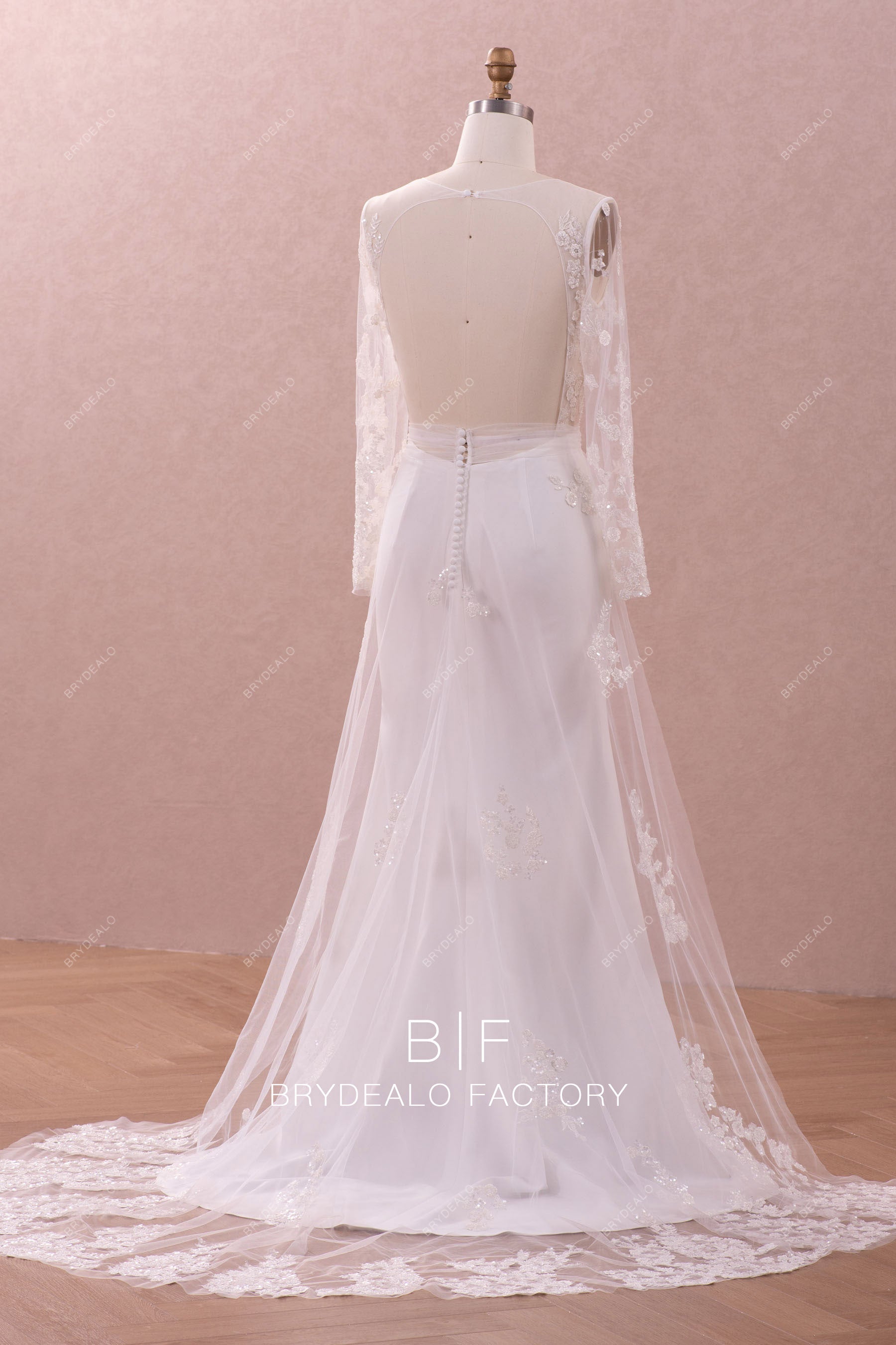 open back sheer sleeveless overskirt wedding dress 