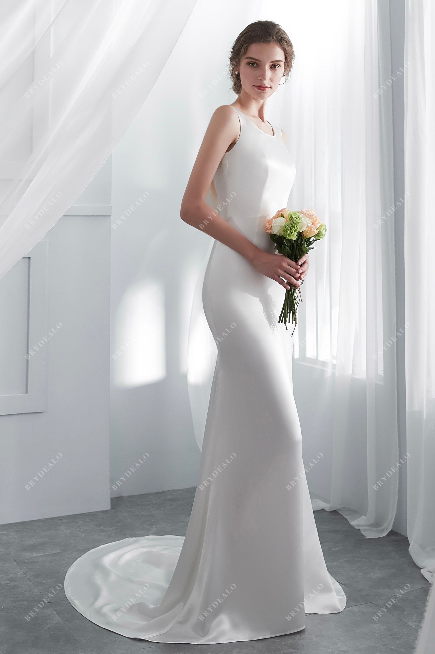 sleeveless mermaid satin designer wedding dress