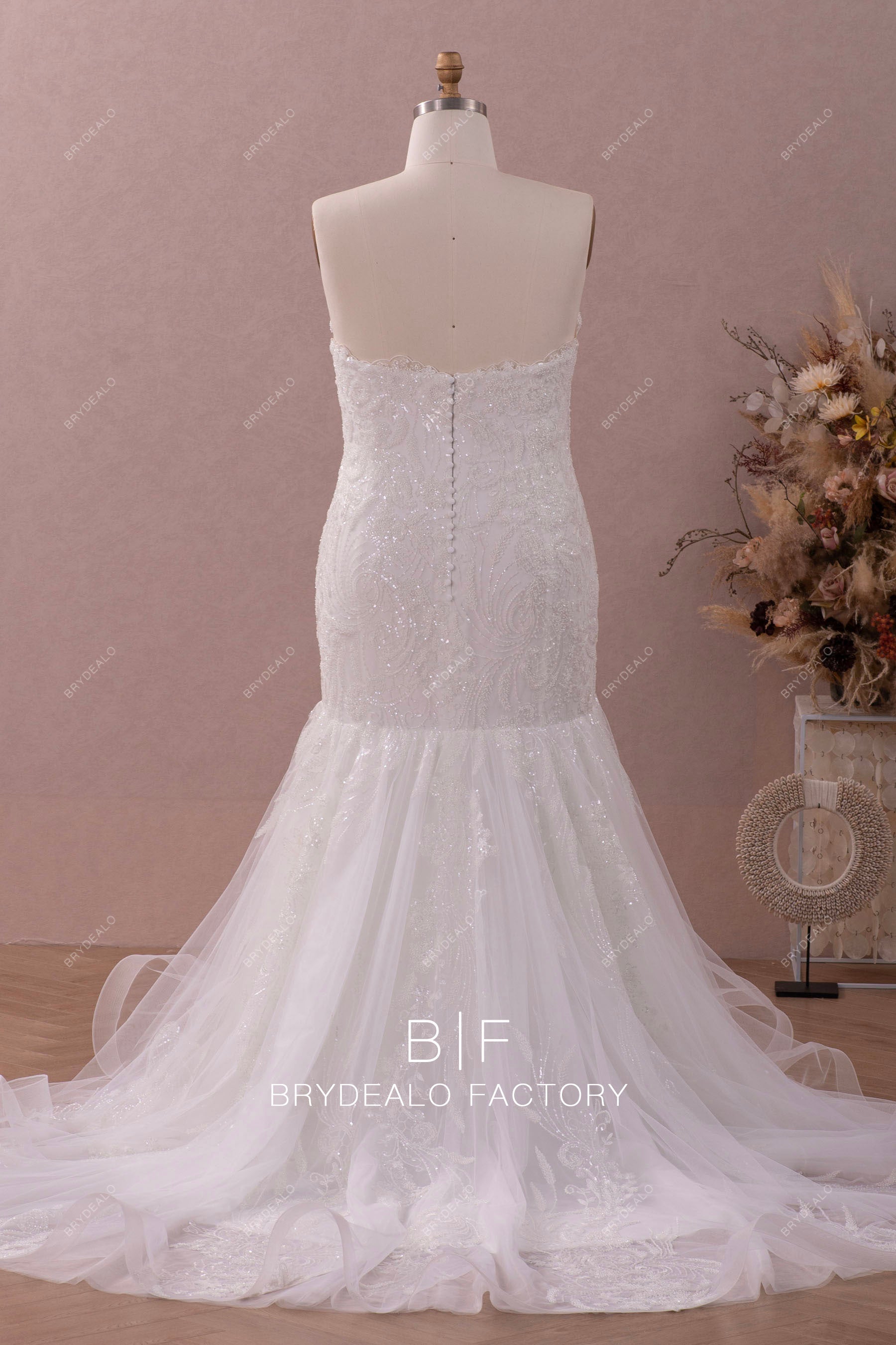 open back strapless ruffled court train trumpet wedding dress