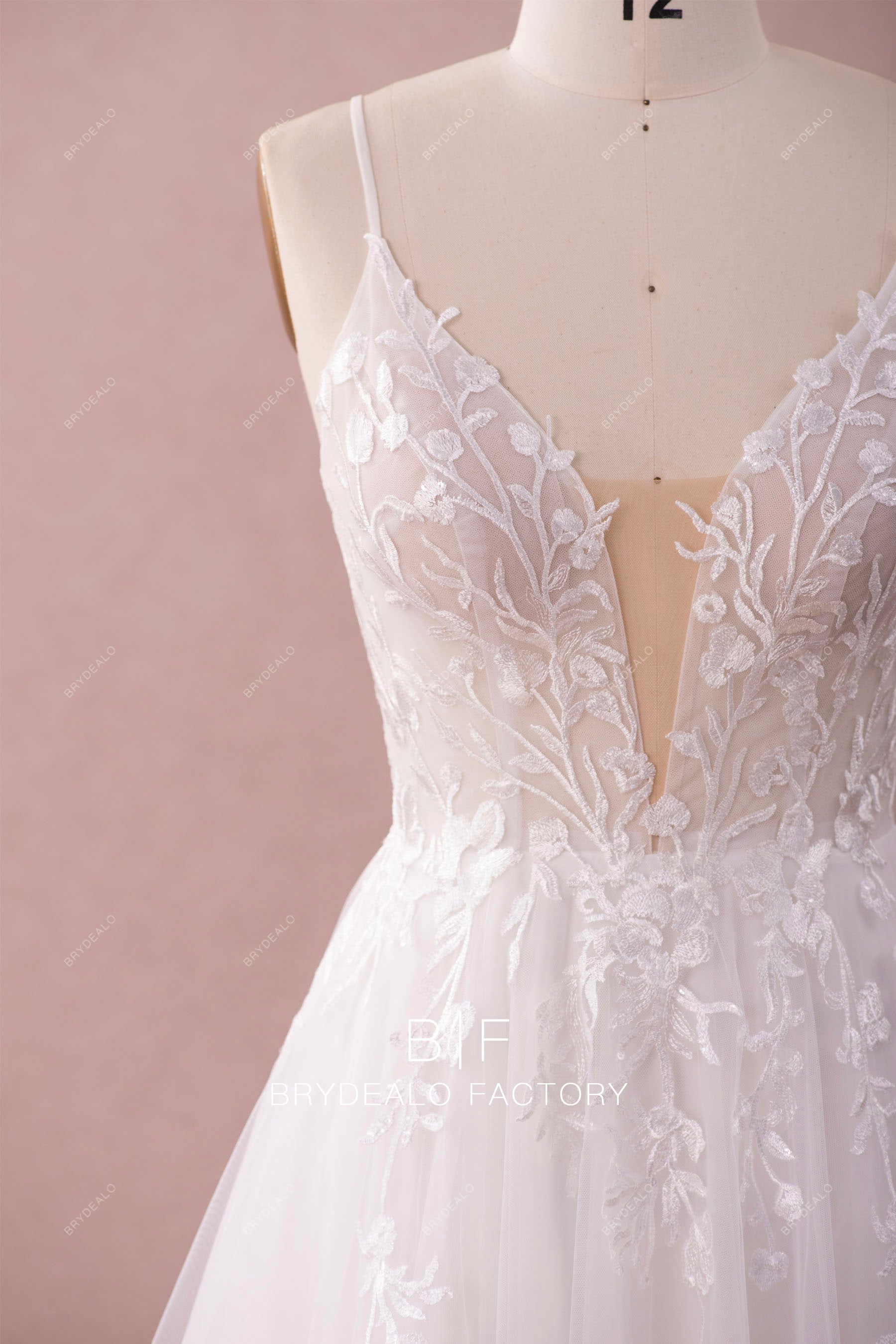 sleeveless deep v-neck bridal dress
