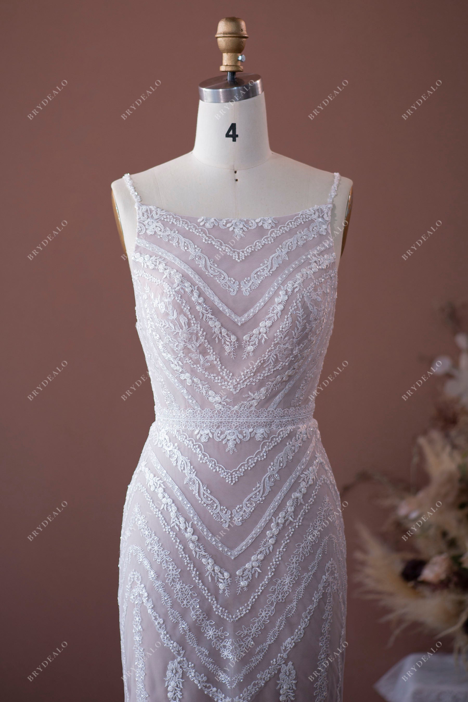 symmetrical leaf patterned lace beach bridal dress