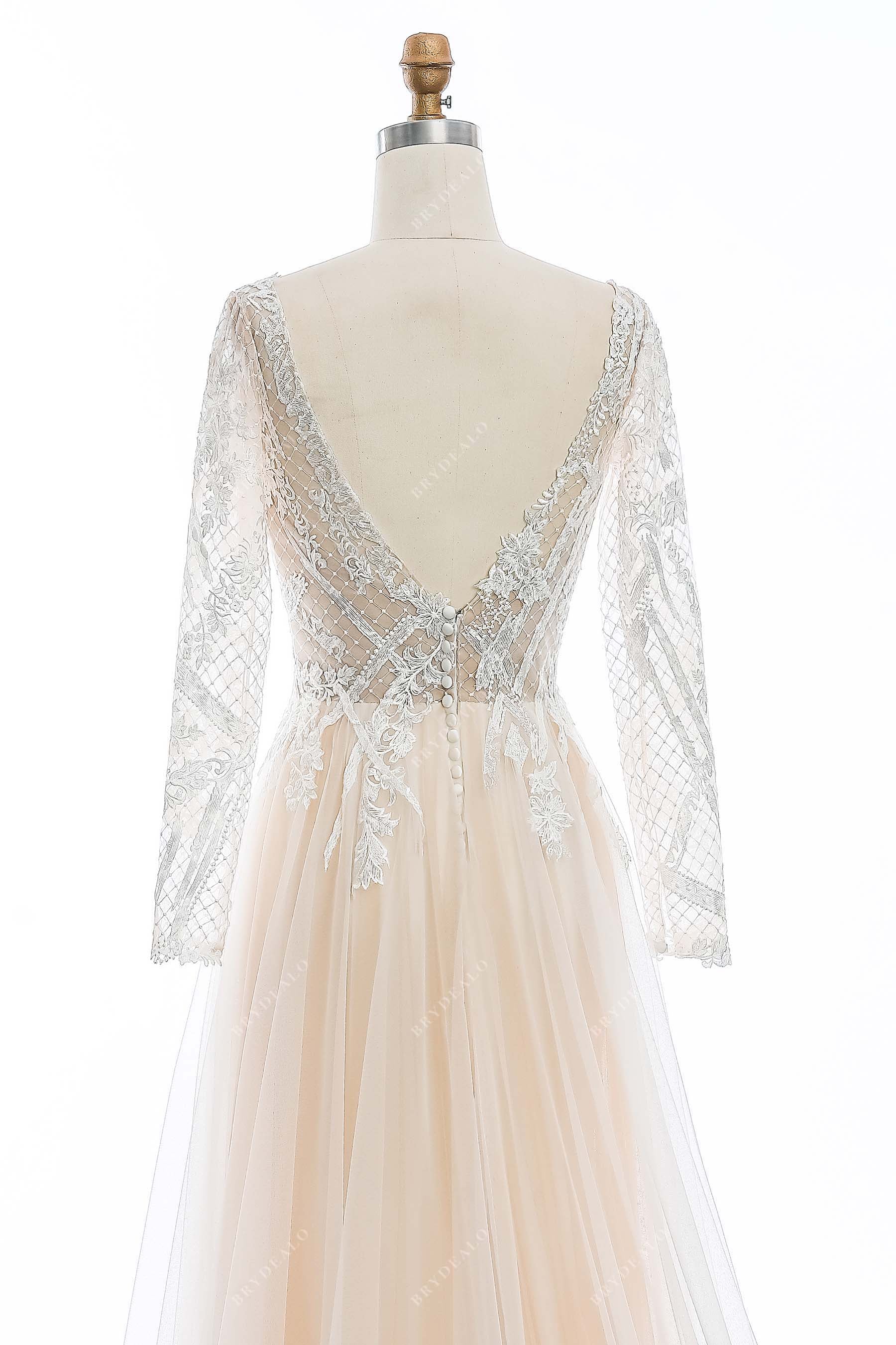 designer lace V-back sheer sleeves bridal gown