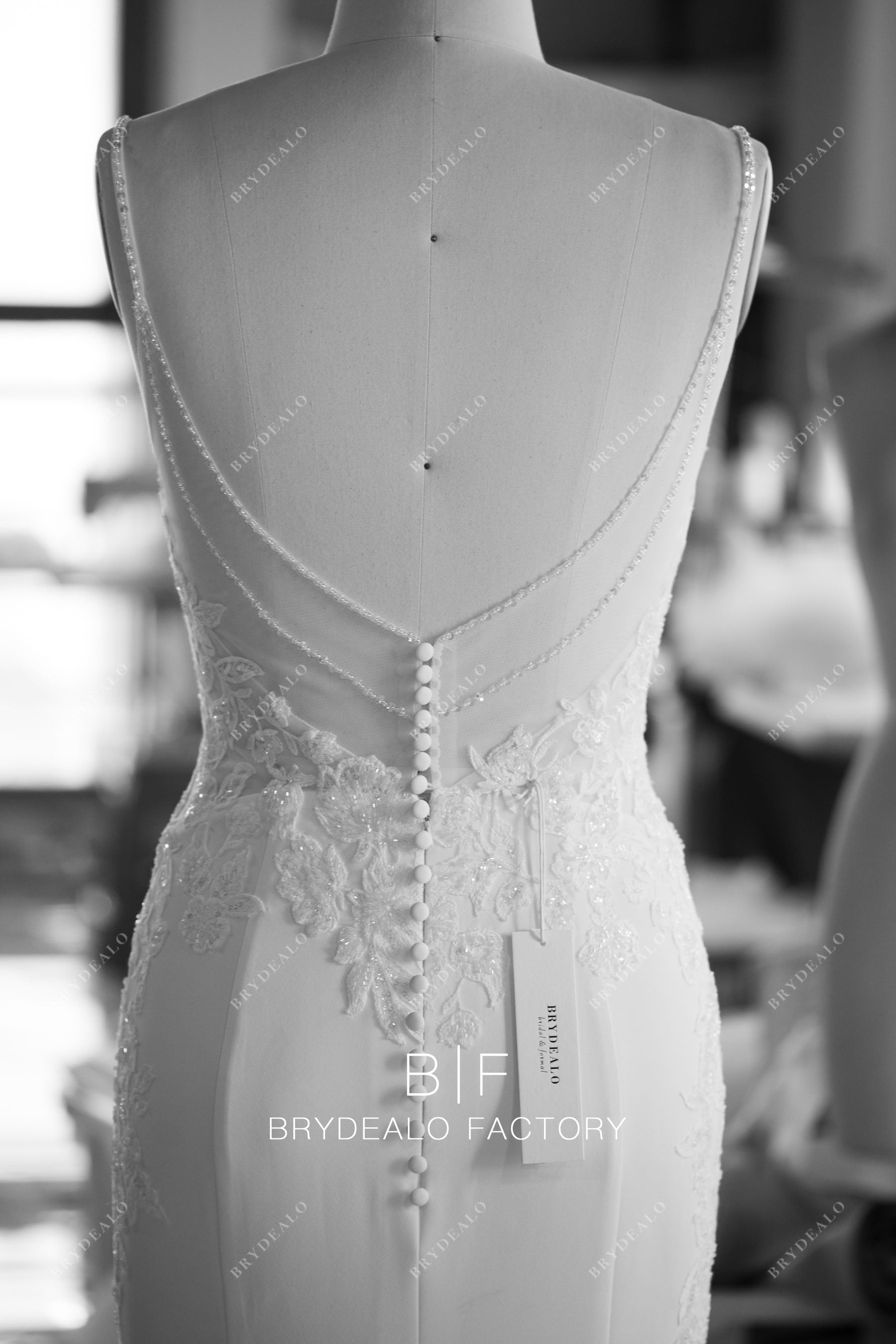 Custom beaded illusion back mermaid wedding dress