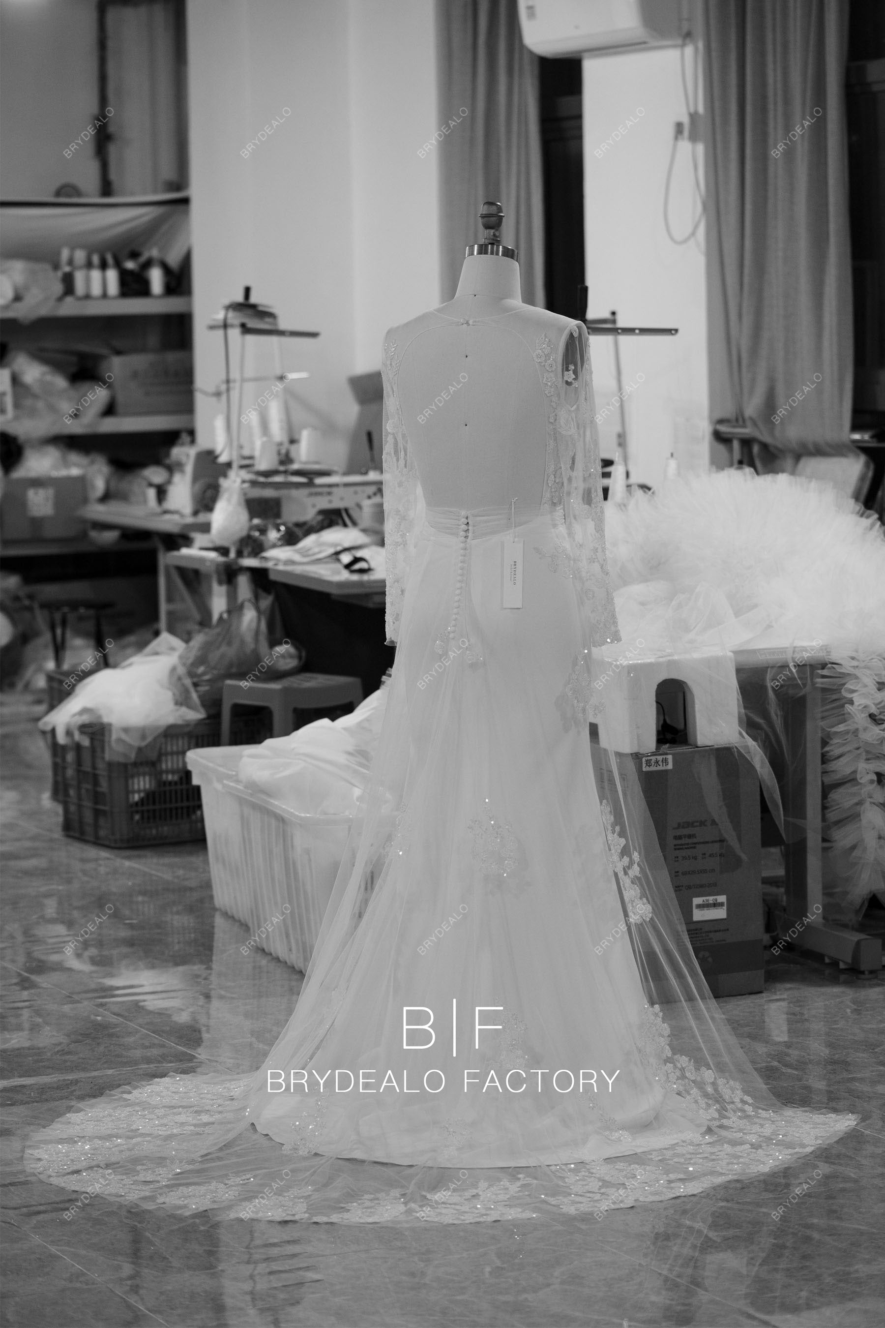 open back illusion lace sleeved crepe long wedding dress