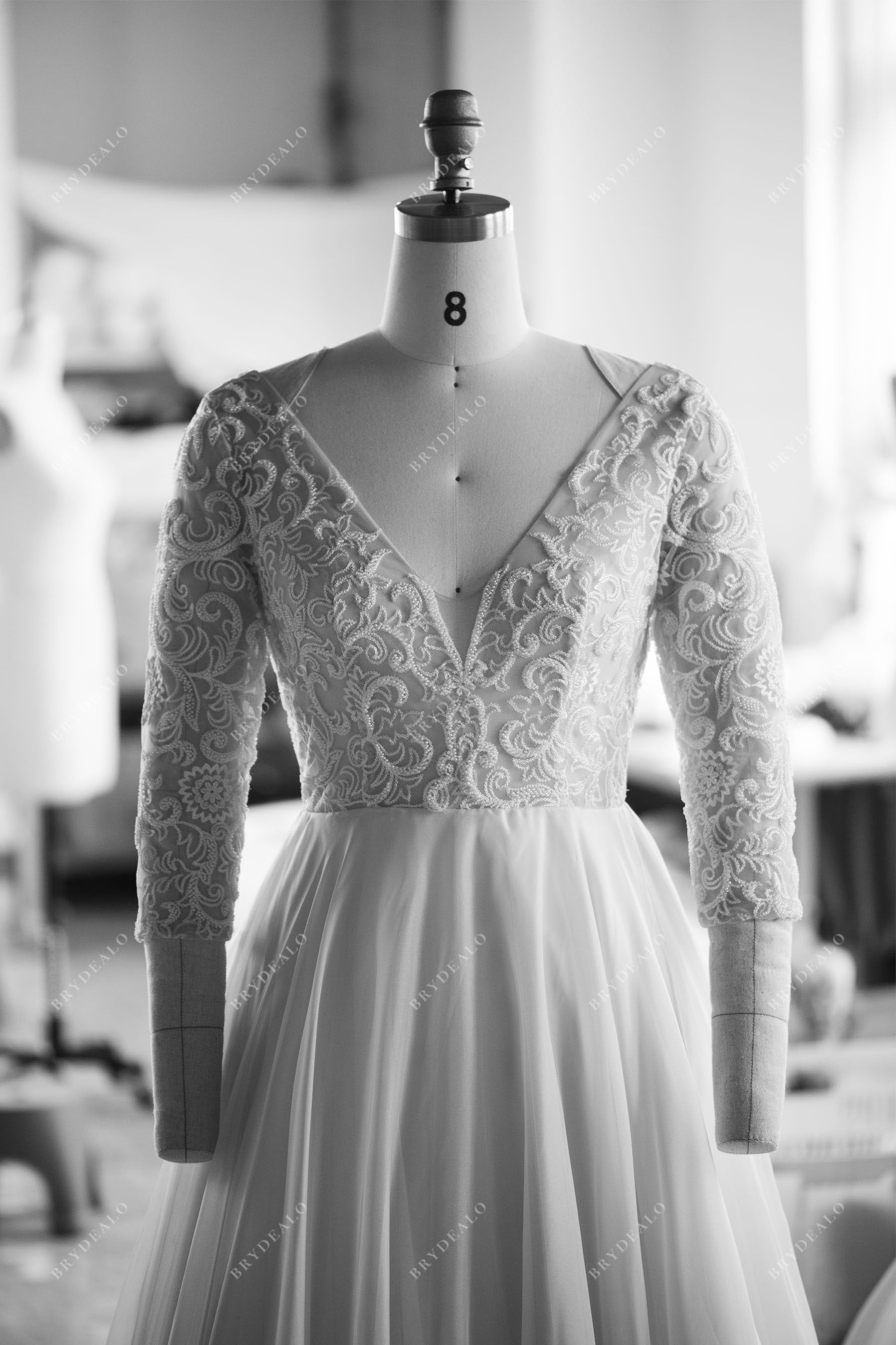 designer  beaded sleeve lace wedding dress