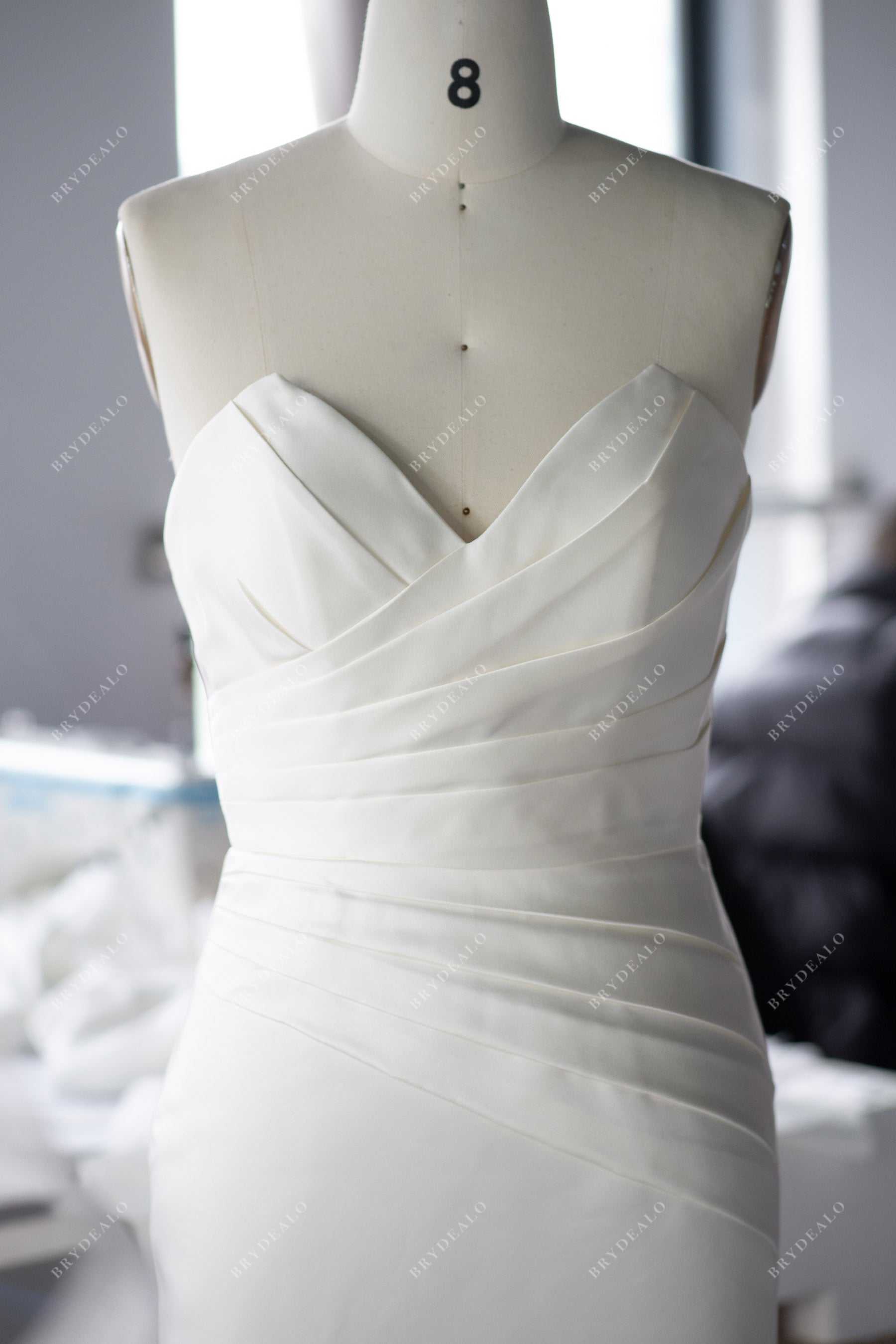 custom-made pleated satin V-neck strapless wedding gown