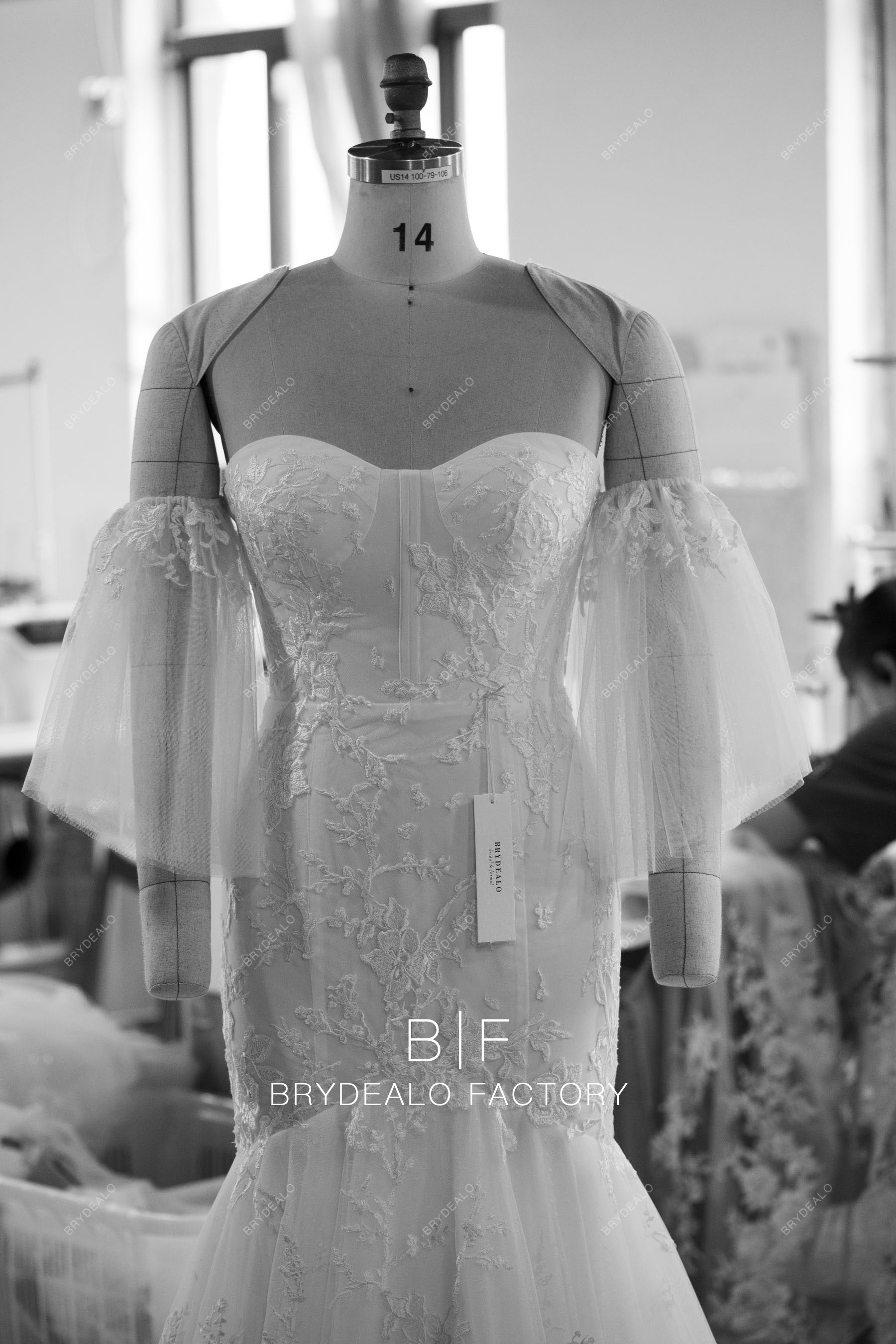 designer flutter sleeves lace trumpet bridal gown