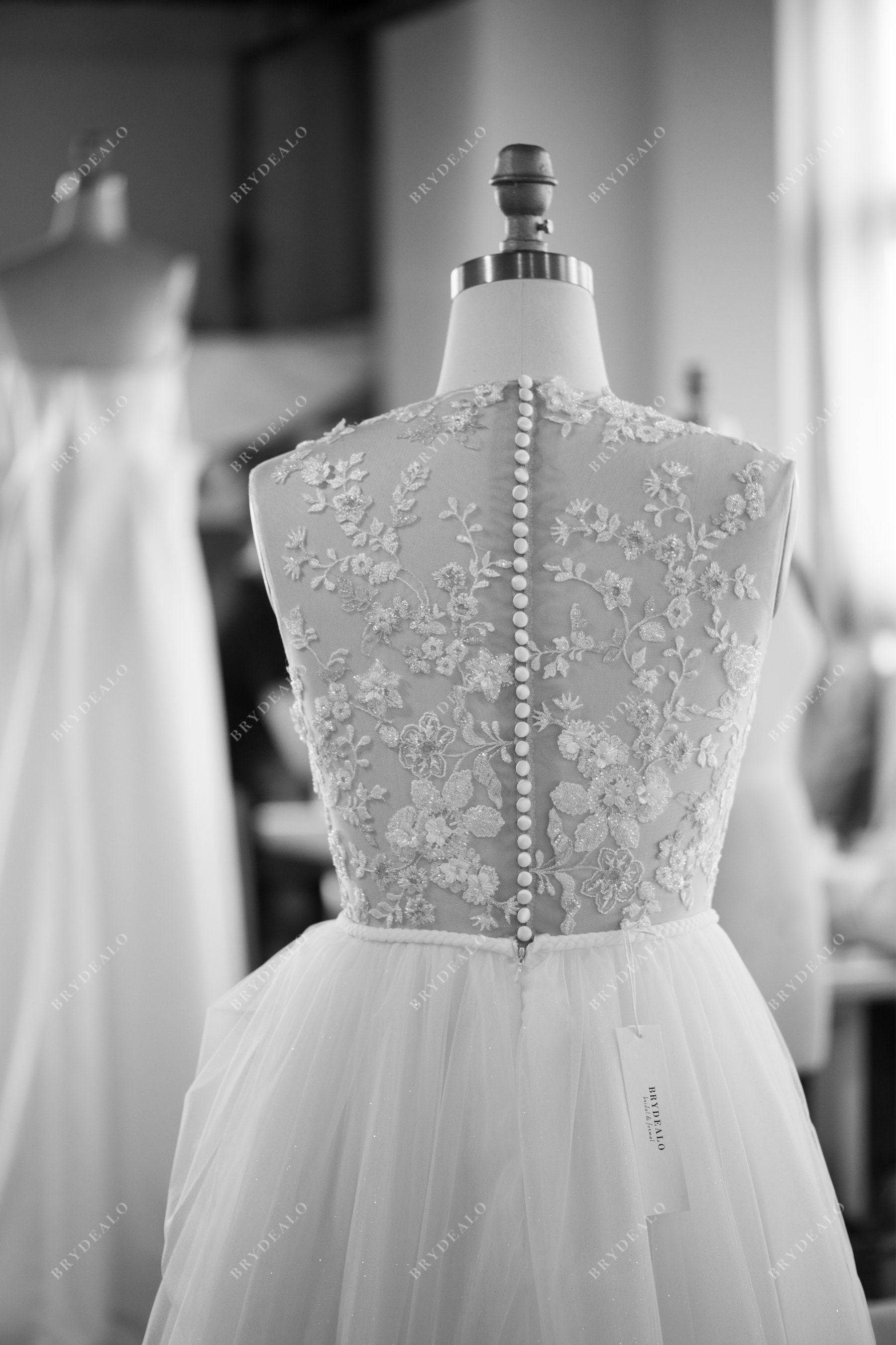designer illusion back lace wedding dress