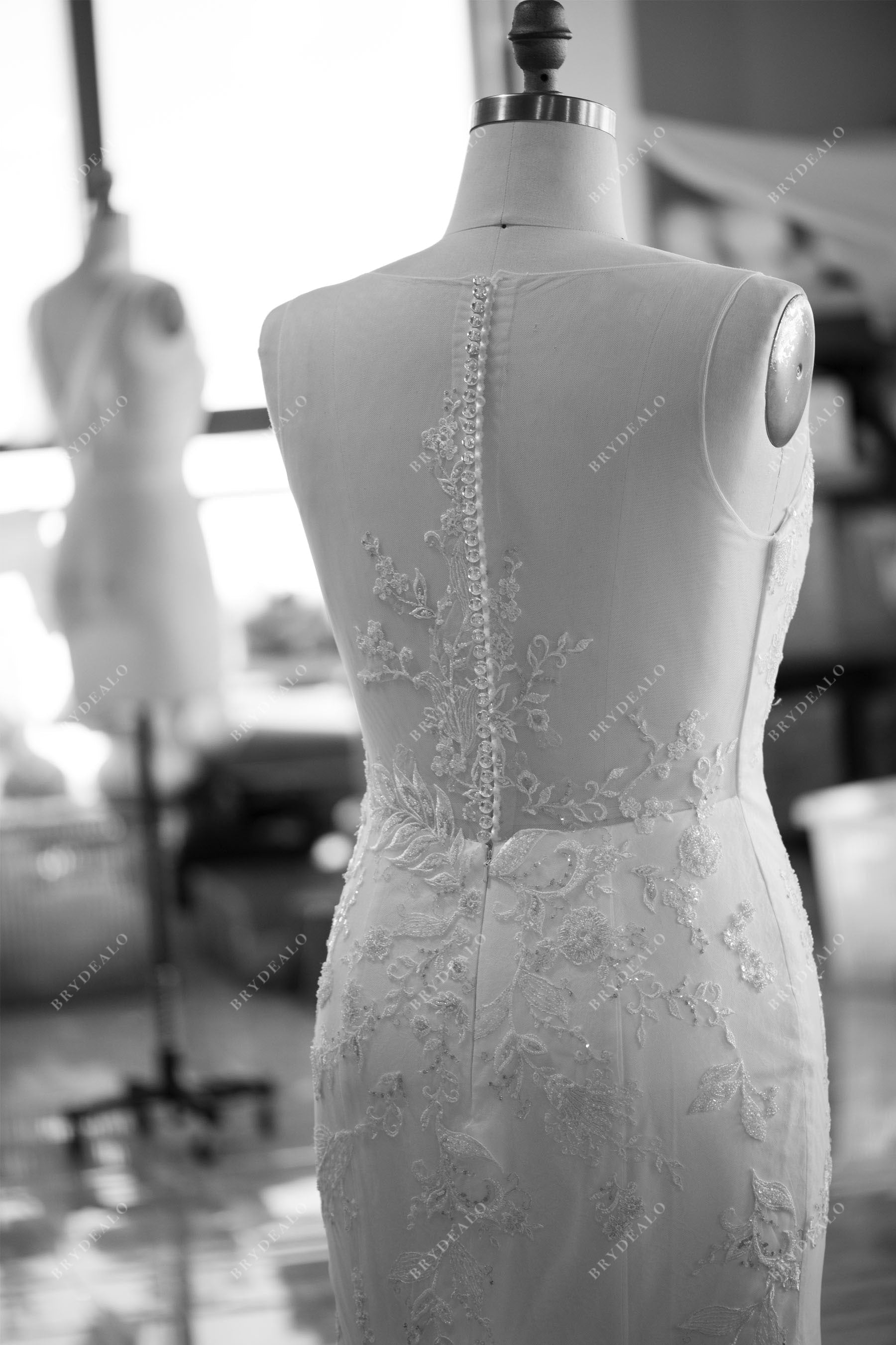 designer illusion buttoned back lace wedding dress